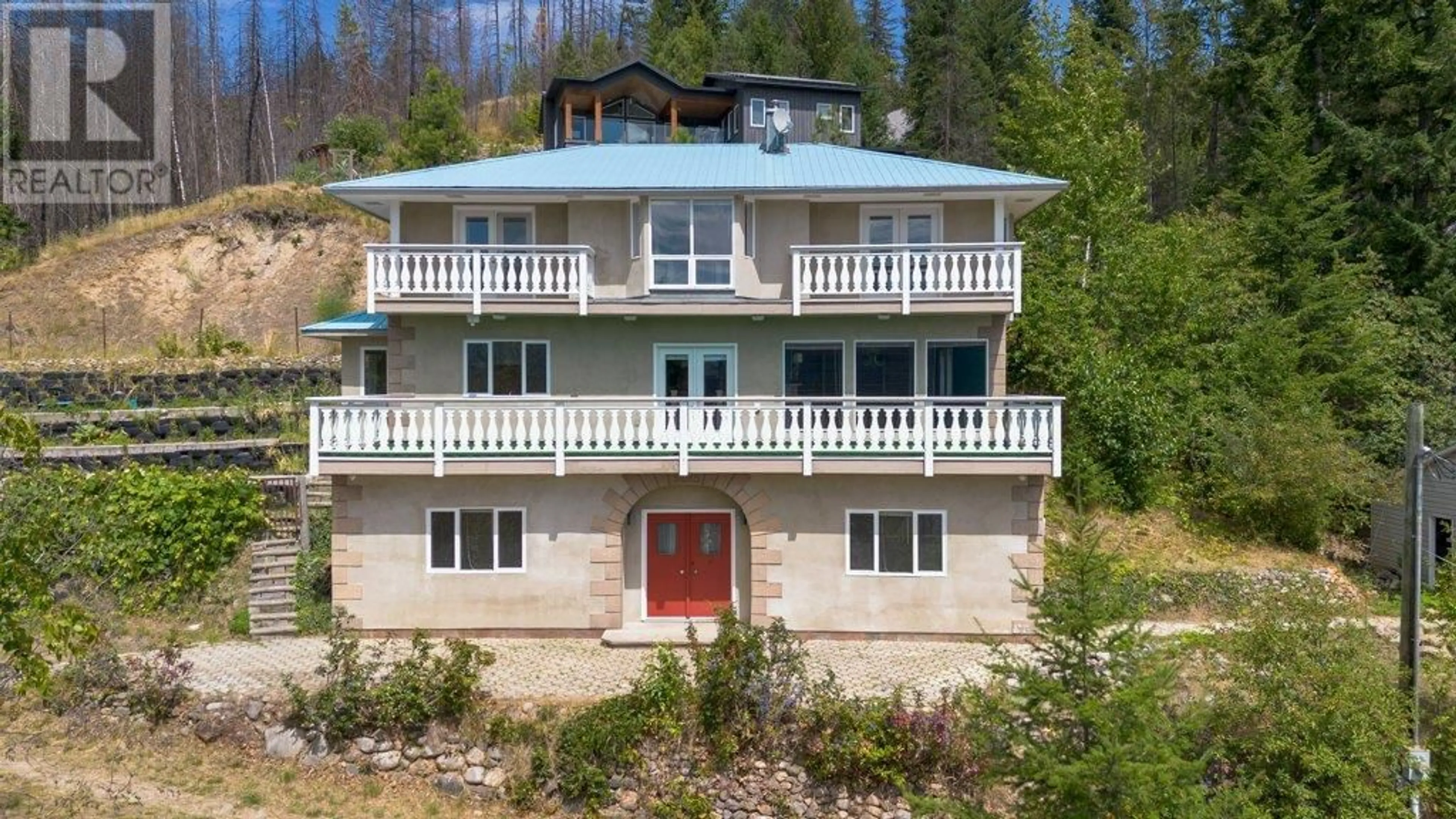 A pic from outside/outdoor area/front of a property/back of a property/a pic from drone, building for 5245 CHASEY ROAD, Celista British Columbia V0E1M6