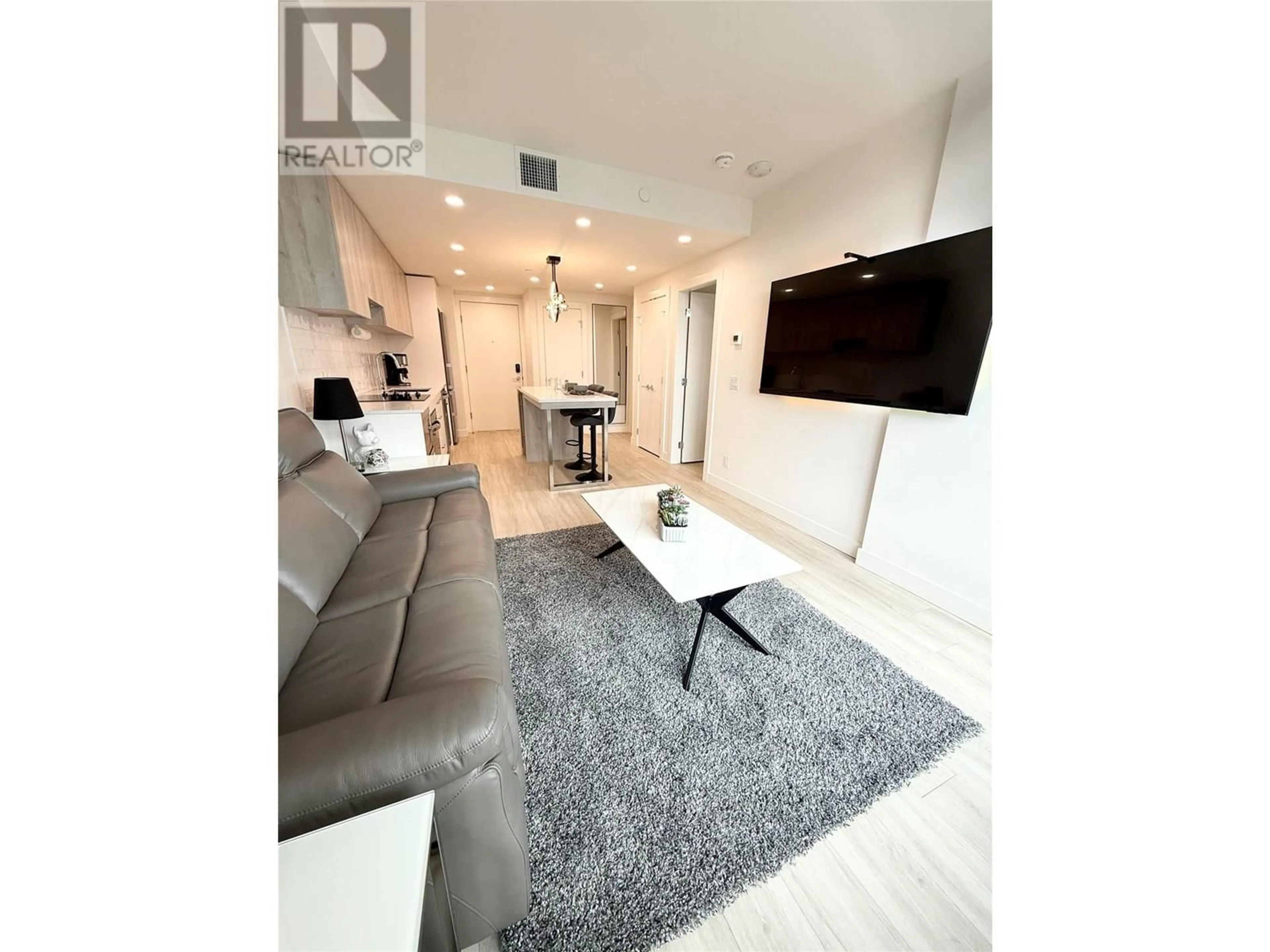 Living room with furniture, unknown for 1301 - 3699 CAPOZZI ROAD, Kelowna British Columbia V1W0G3