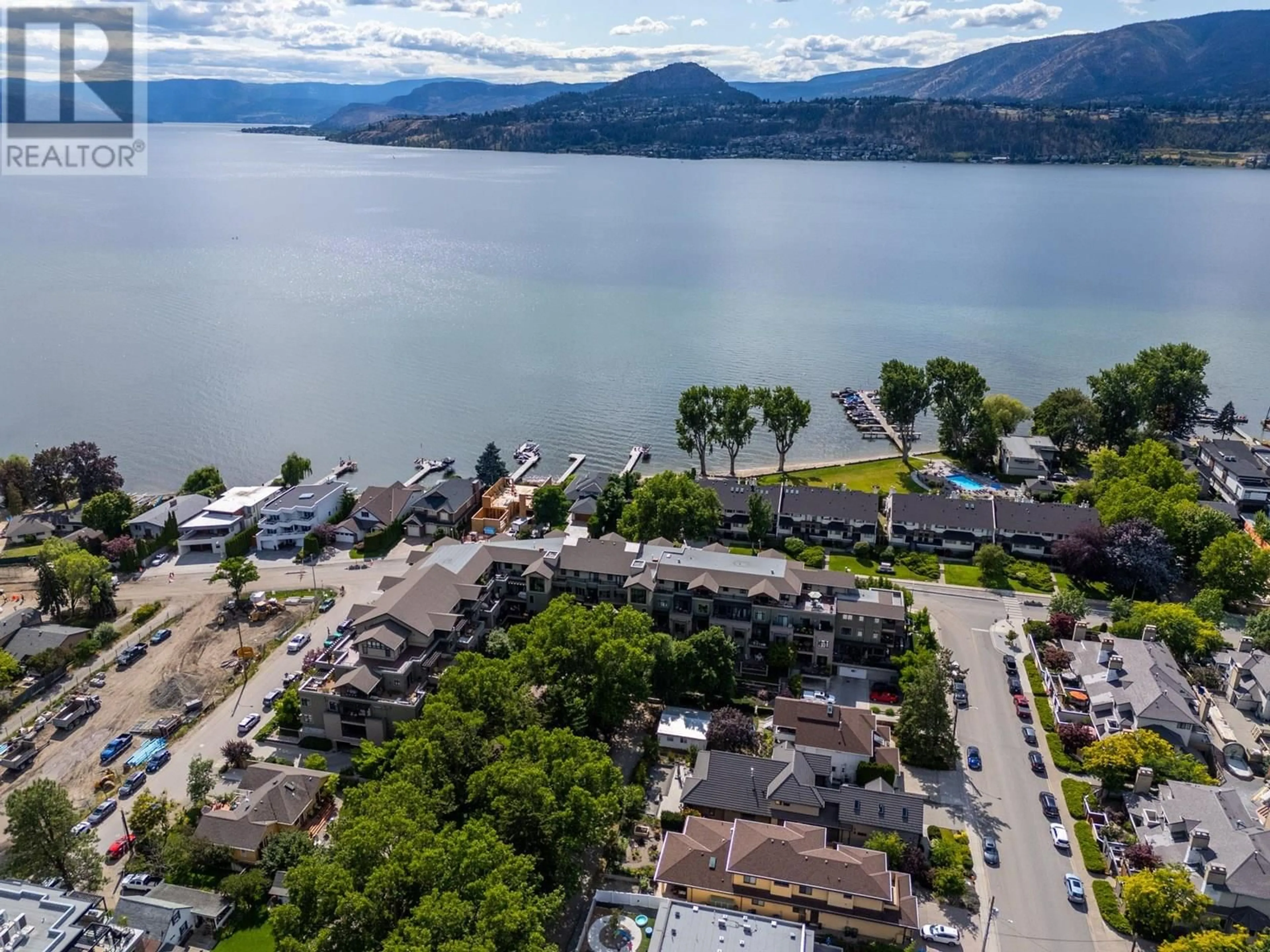A pic from outside/outdoor area/front of a property/back of a property/a pic from drone, water/lake/river/ocean view for 204 - 2901 ABBOTT STREET, Kelowna British Columbia V1Y1G7