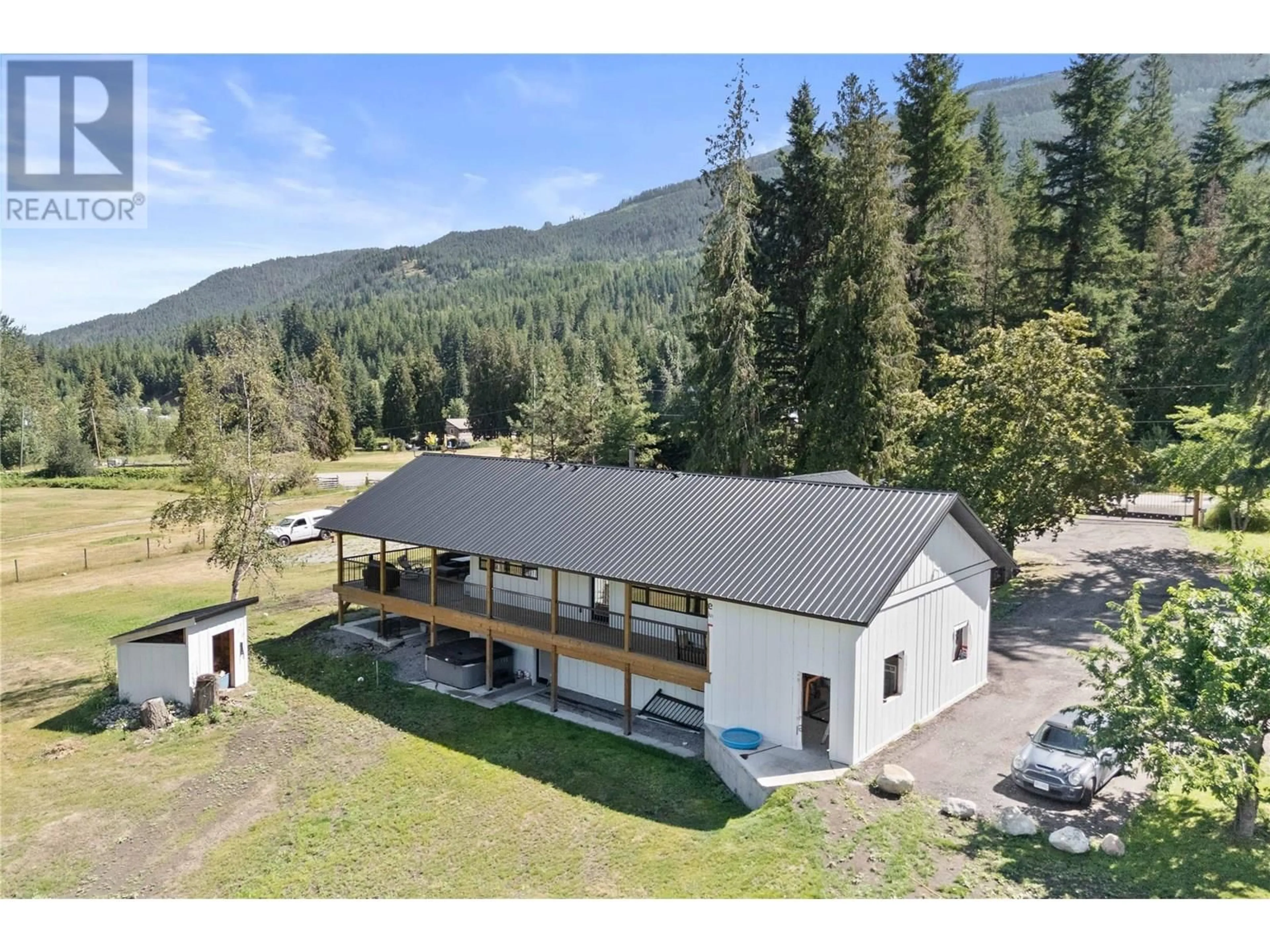 A pic from outside/outdoor area/front of a property/back of a property/a pic from drone, mountain view for 22 PARSONS ROAD, Mara British Columbia V0E2K0