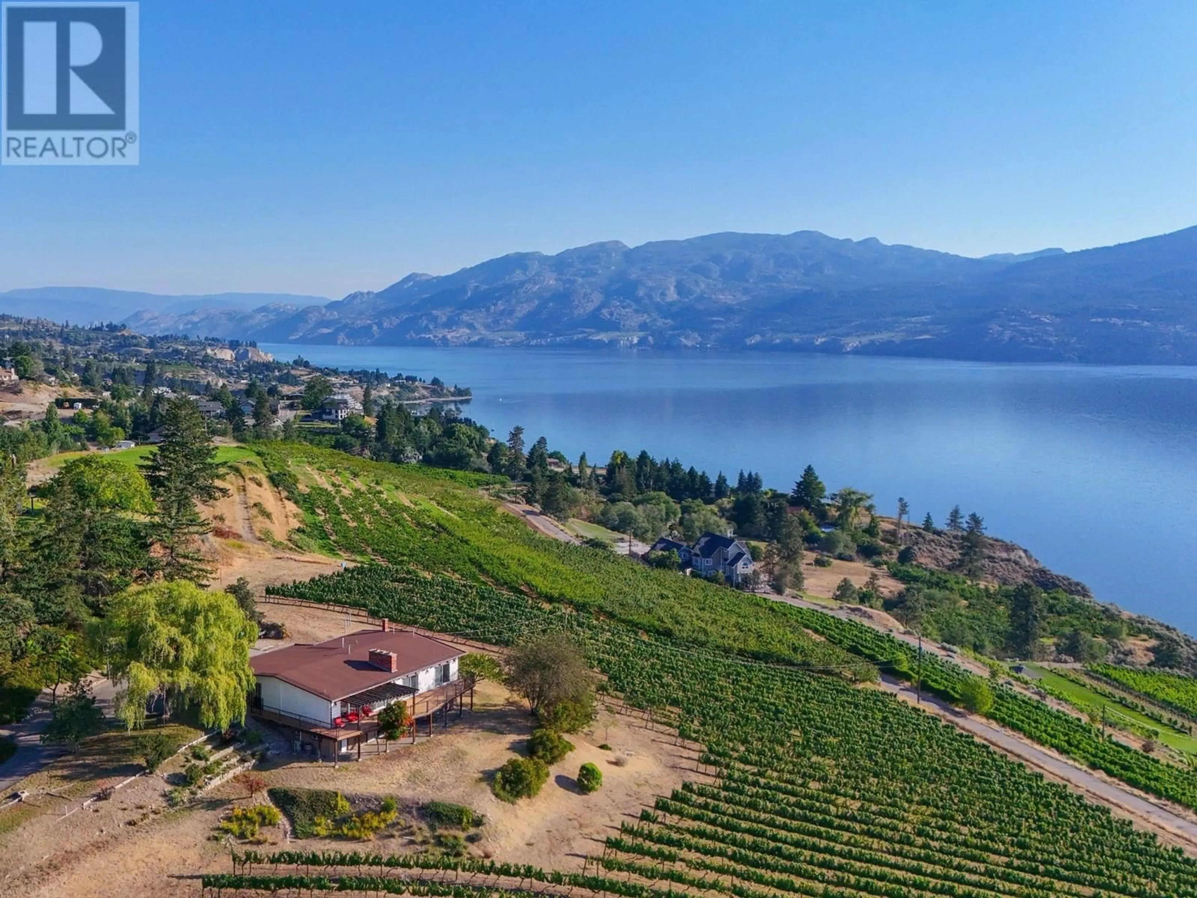 A pic from outside/outdoor area/front of a property/back of a property/a pic from drone, water/lake/river/ocean view for 9402 FRONT BENCH ROAD, Summerland British Columbia V0H1Z4