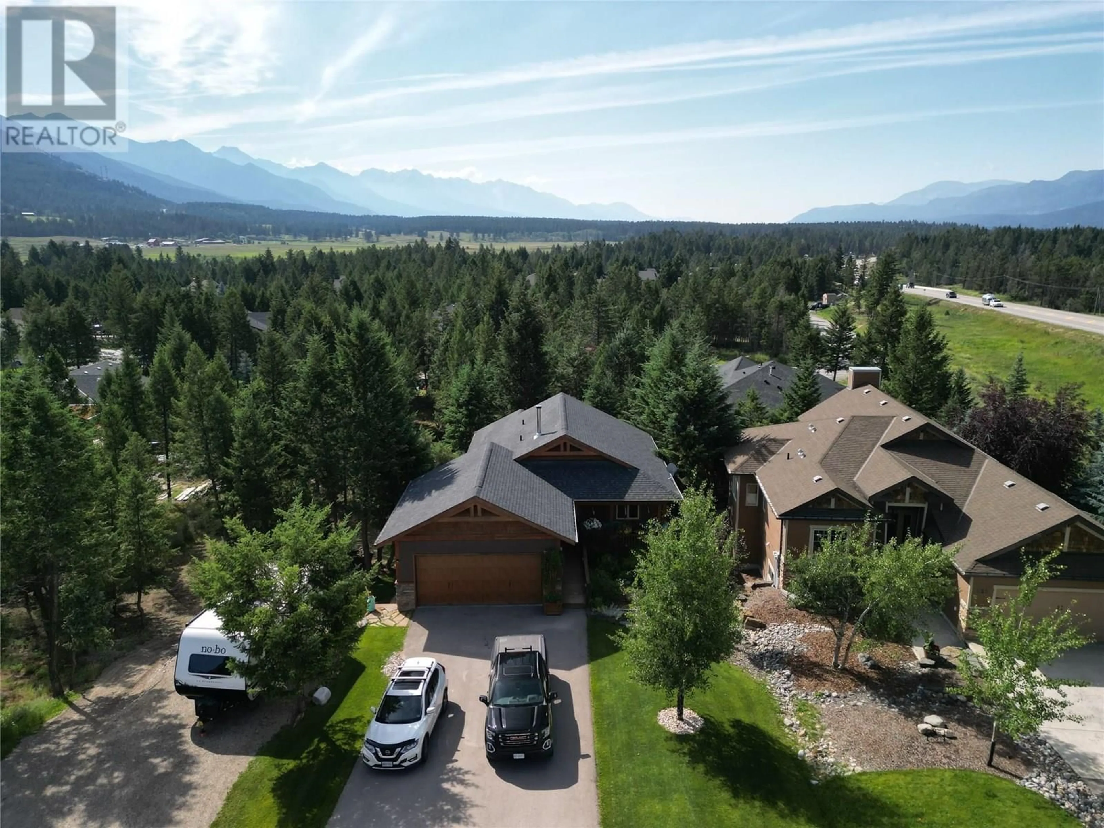 A pic from outside/outdoor area/front of a property/back of a property/a pic from drone, mountain view for 917 COPPER POINT WAY, Windermere British Columbia V0A1K3