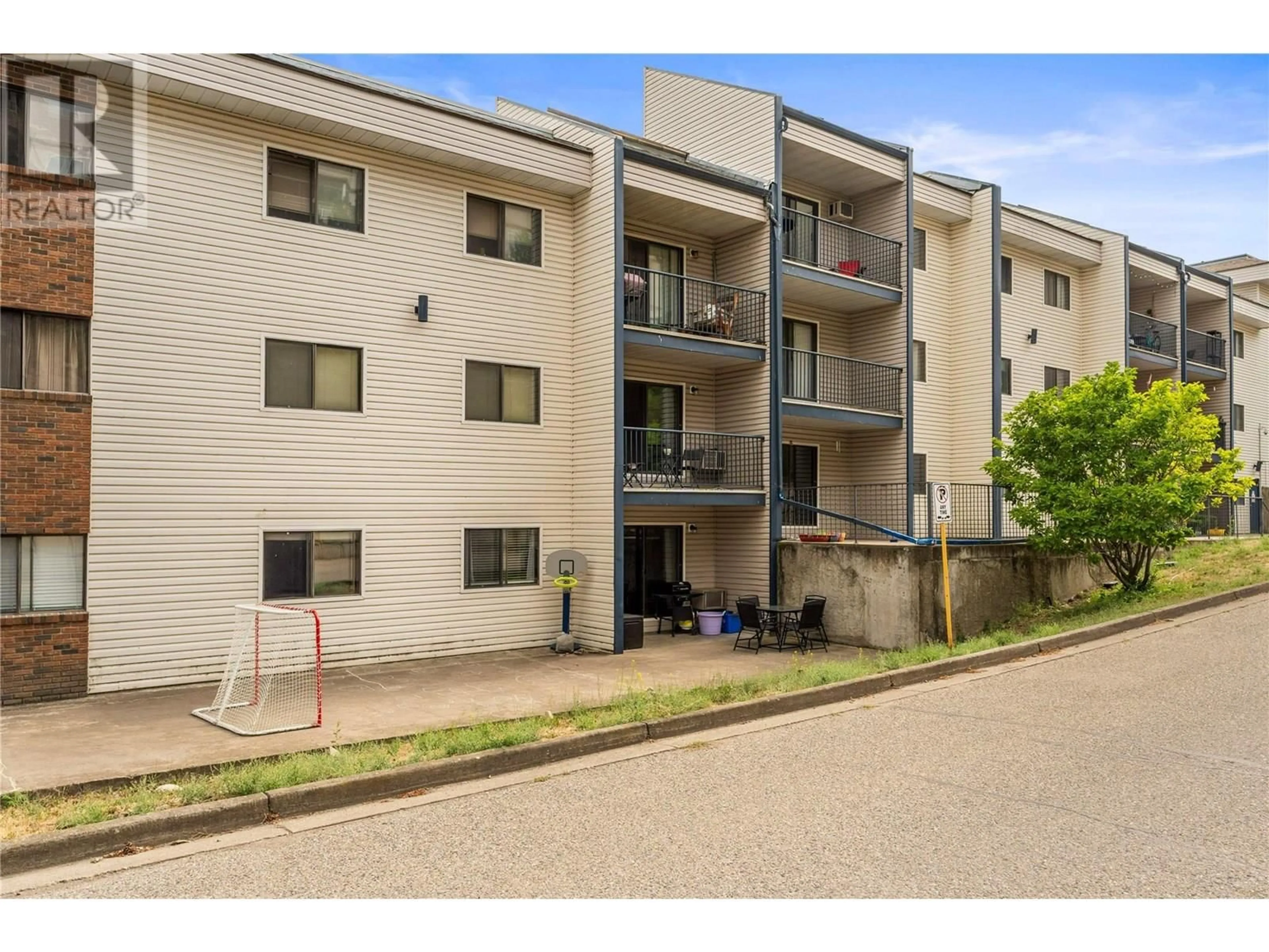A pic from outside/outdoor area/front of a property/back of a property/a pic from drone, street for 324 - 3901 32 AVENUE, Vernon British Columbia V1T8M3
