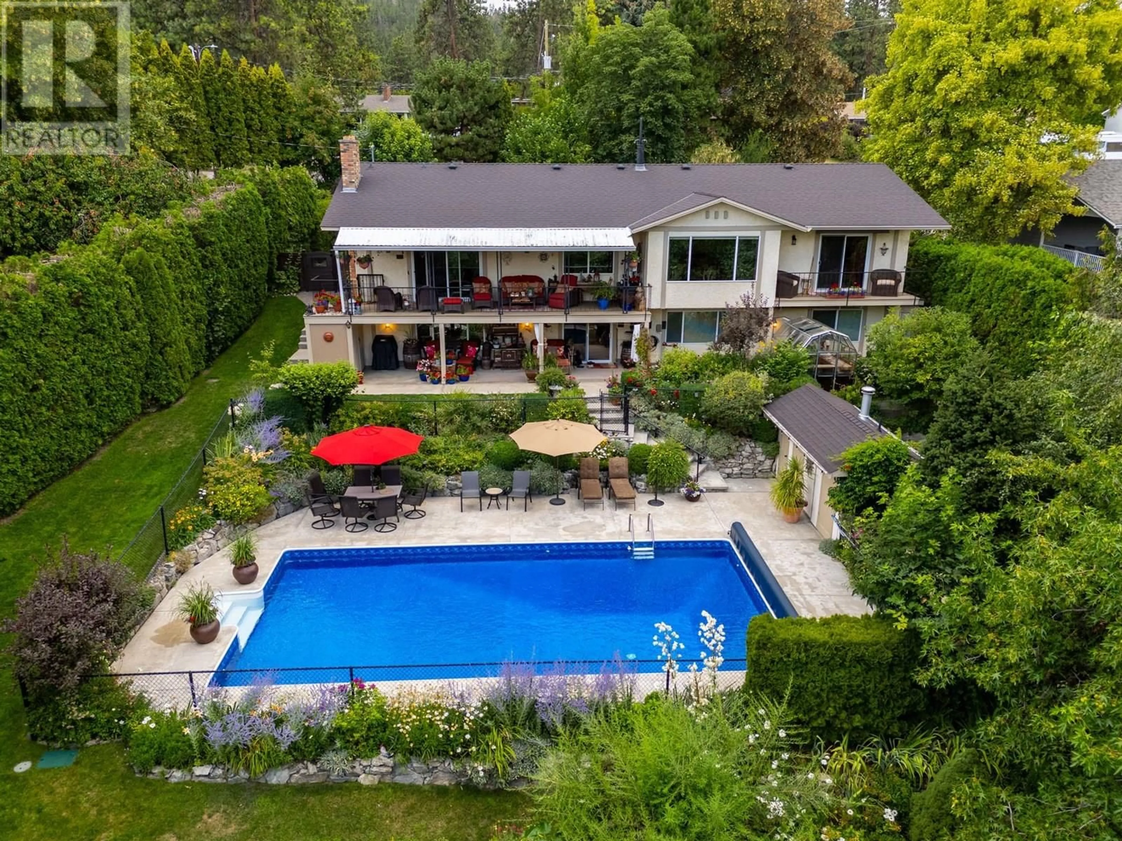 A pic from outside/outdoor area/front of a property/back of a property/a pic from drone, water/lake/river/ocean view for 13 ALAMEDA COURT, Kelowna British Columbia V1V1C6
