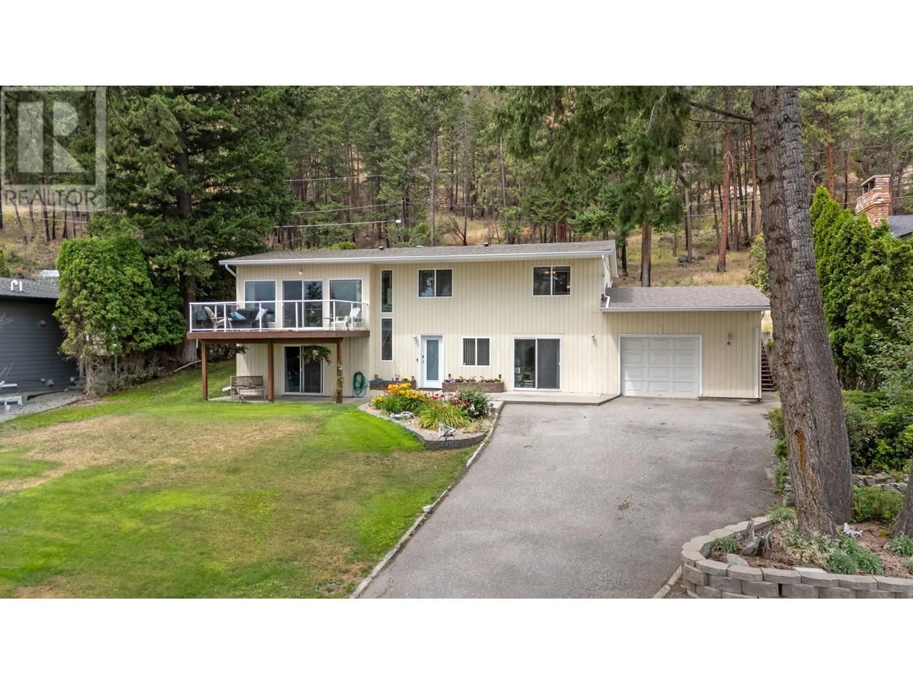 A pic from outside/outdoor area/front of a property/back of a property/a pic from drone, water/lake/river/ocean view for 1338 PARKINSON ROAD, West Kelowna British Columbia V1Z2R7