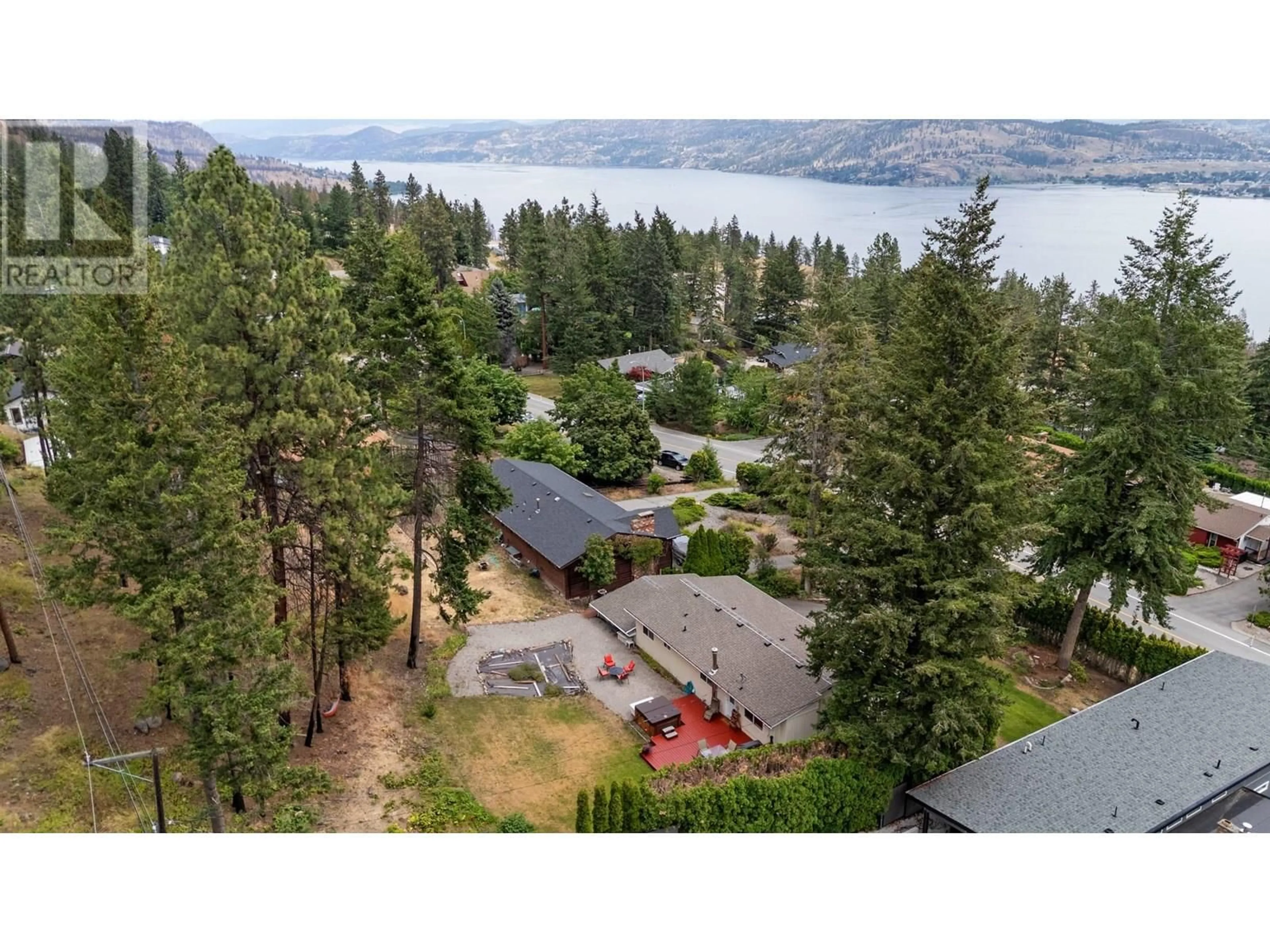 A pic from outside/outdoor area/front of a property/back of a property/a pic from drone, water/lake/river/ocean view for 1338 PARKINSON ROAD, West Kelowna British Columbia V1Z2R7