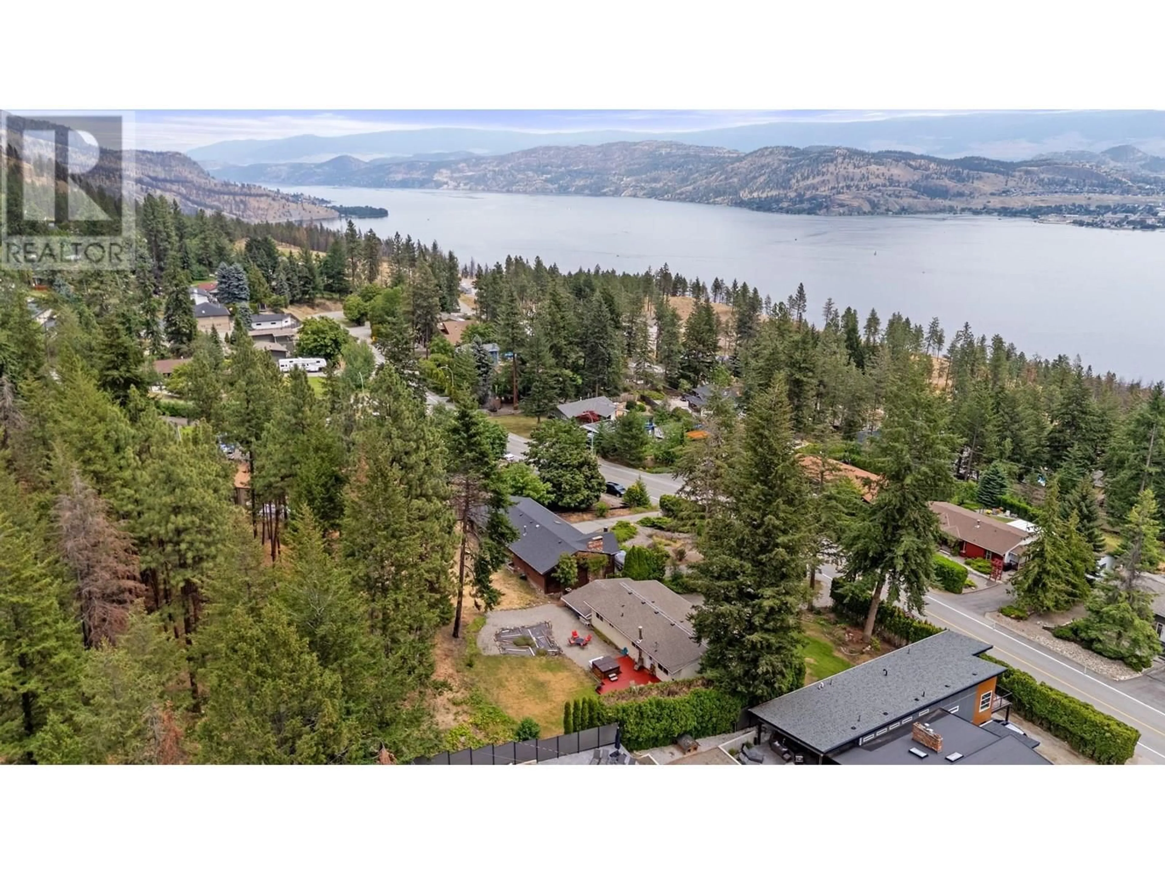 A pic from outside/outdoor area/front of a property/back of a property/a pic from drone, water/lake/river/ocean view for 1338 PARKINSON ROAD, West Kelowna British Columbia V1Z2R7