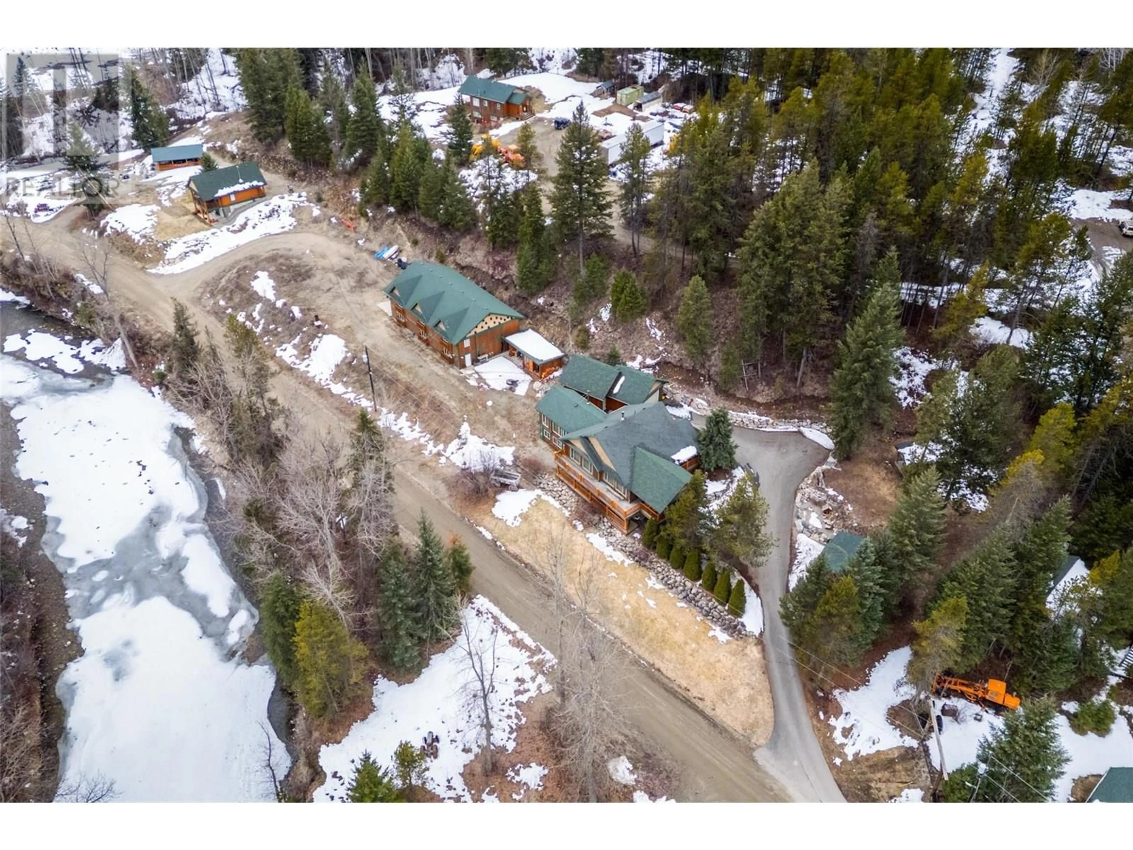 A pic from outside/outdoor area/front of a property/back of a property/a pic from drone, mountain view for 95 & 105 DALE AVENUE, Carmi British Columbia V0H1A0