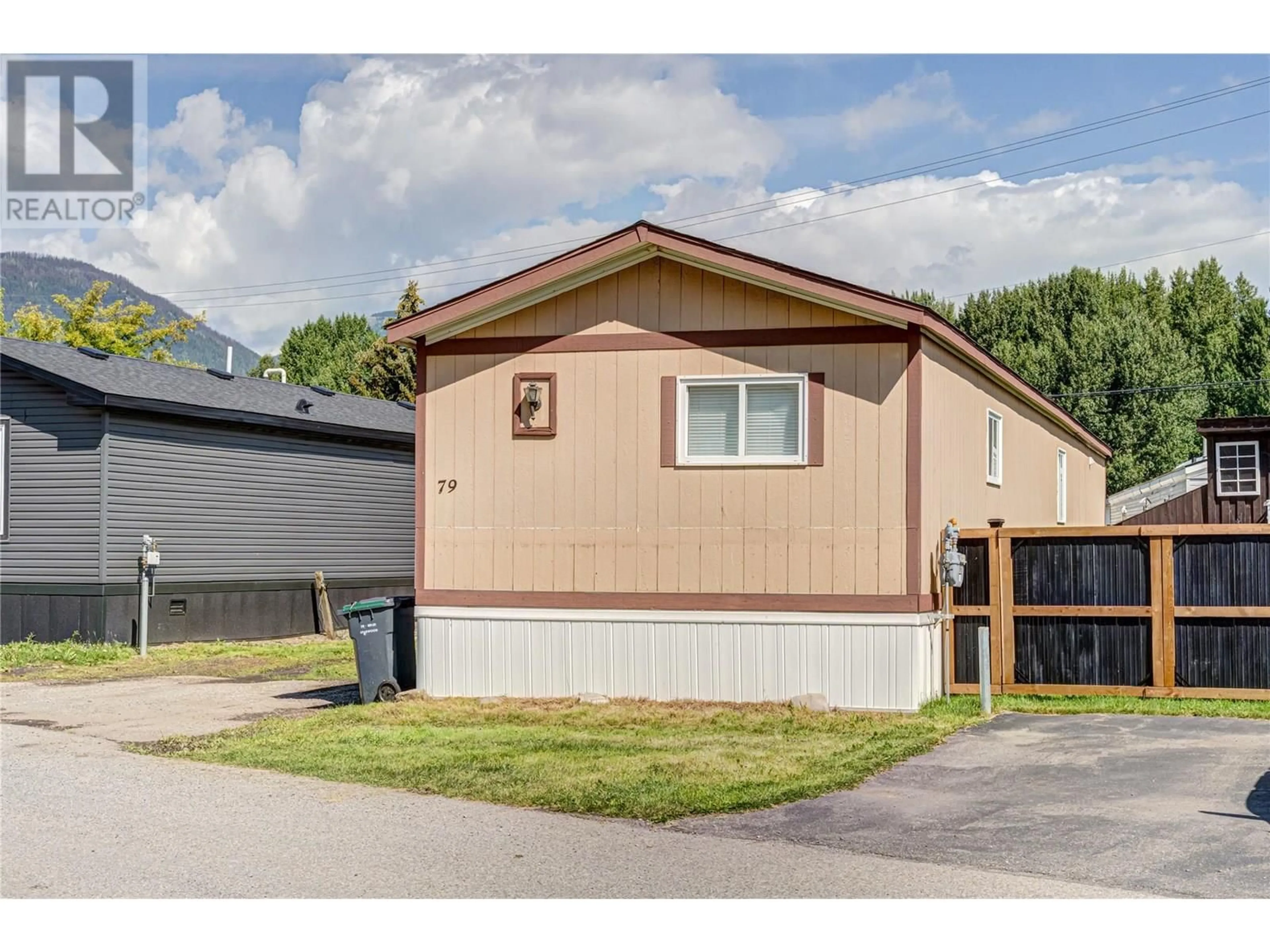 Home with vinyl exterior material, street for 79 - 100 ASPEN DRIVE, Sparwood British Columbia V0B2G0