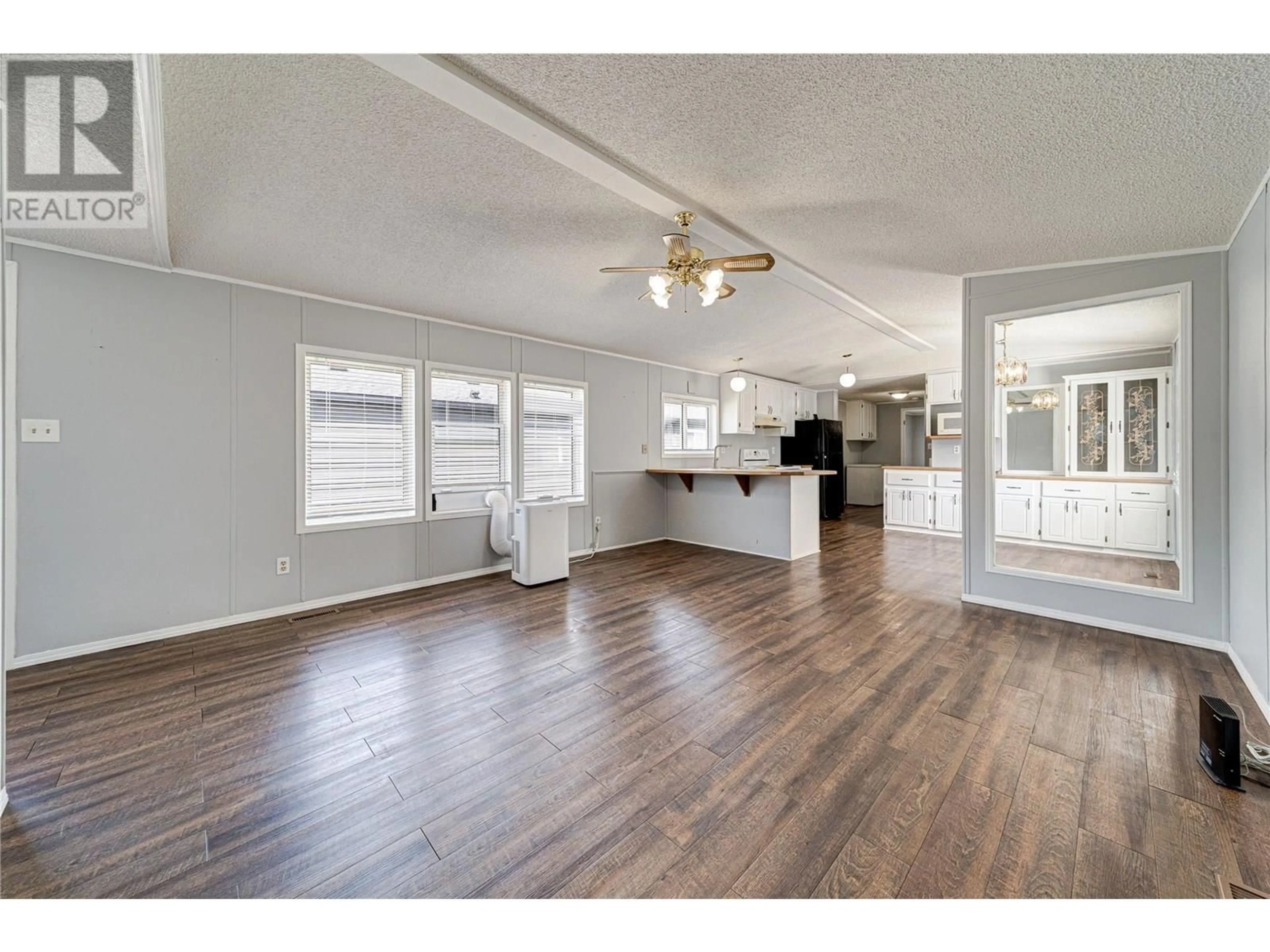 Open concept kitchen, wood/laminate floor for 79 - 100 ASPEN DRIVE, Sparwood British Columbia V0B2G0