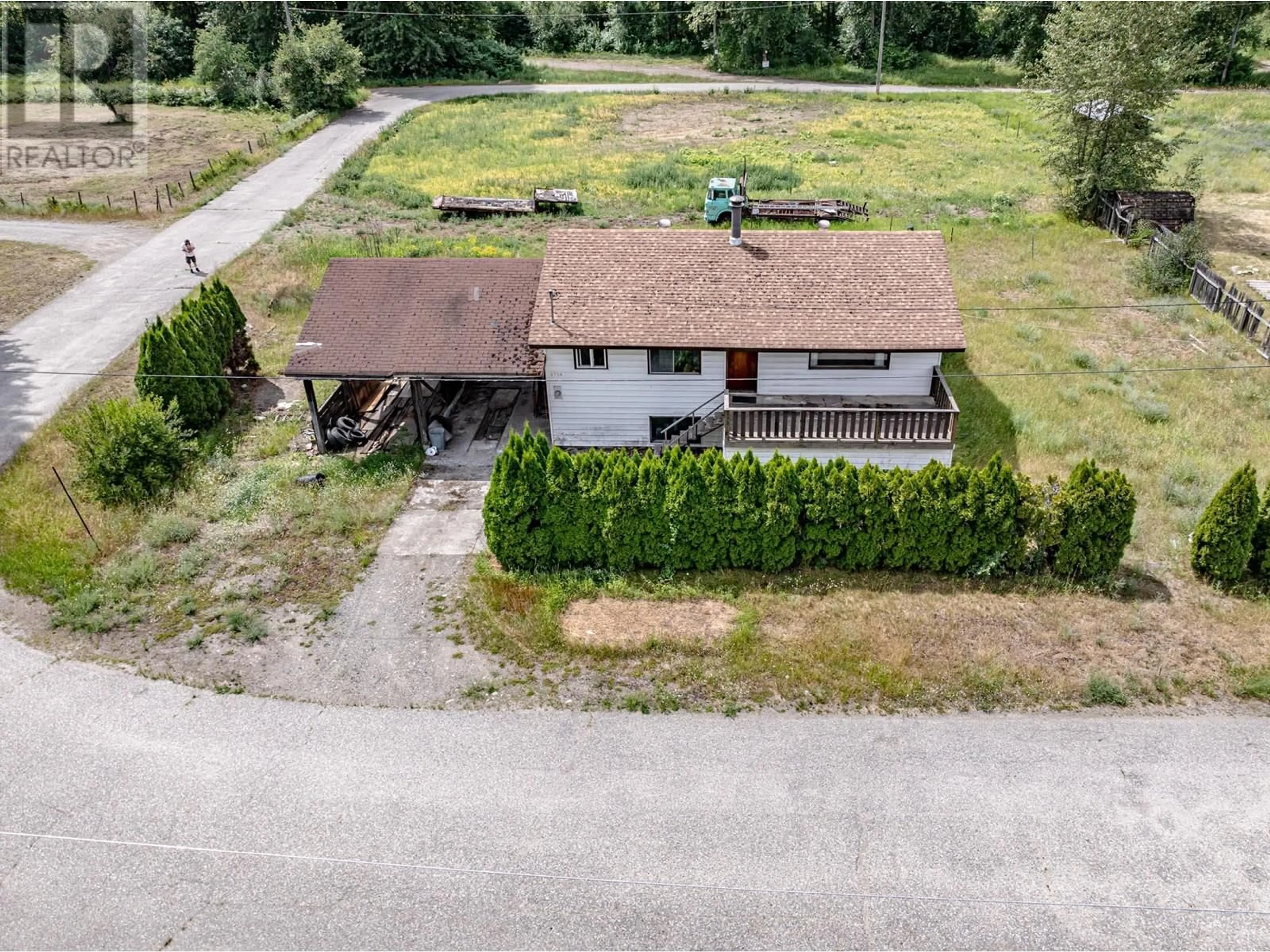 A pic from outside/outdoor area/front of a property/back of a property/a pic from drone, unknown for 5714 SECOND AVENUE, Salmo British Columbia V0G1Z0