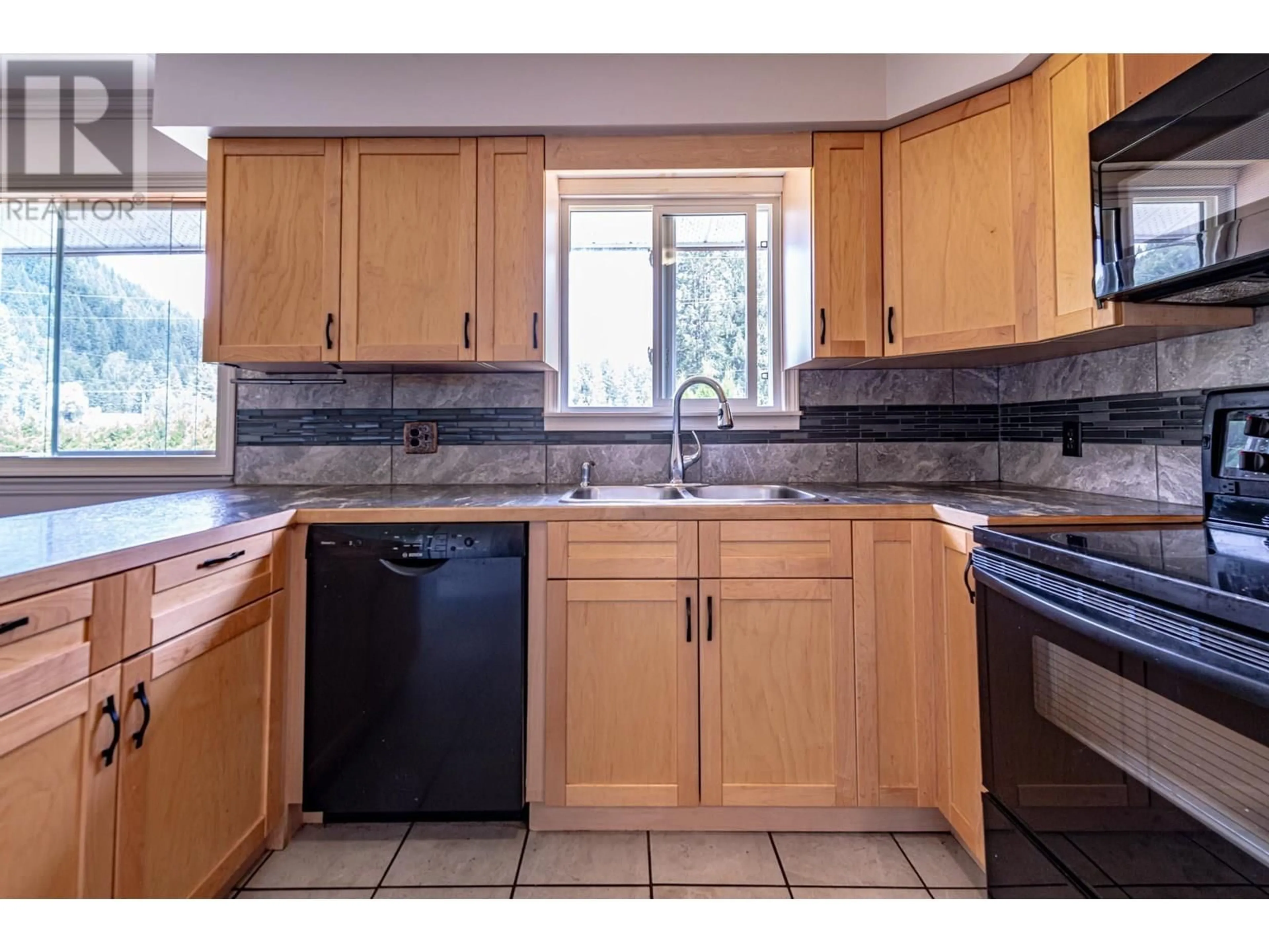 Standard kitchen, ceramic/tile floor for 5714 SECOND AVENUE, Salmo British Columbia V0G1Z0