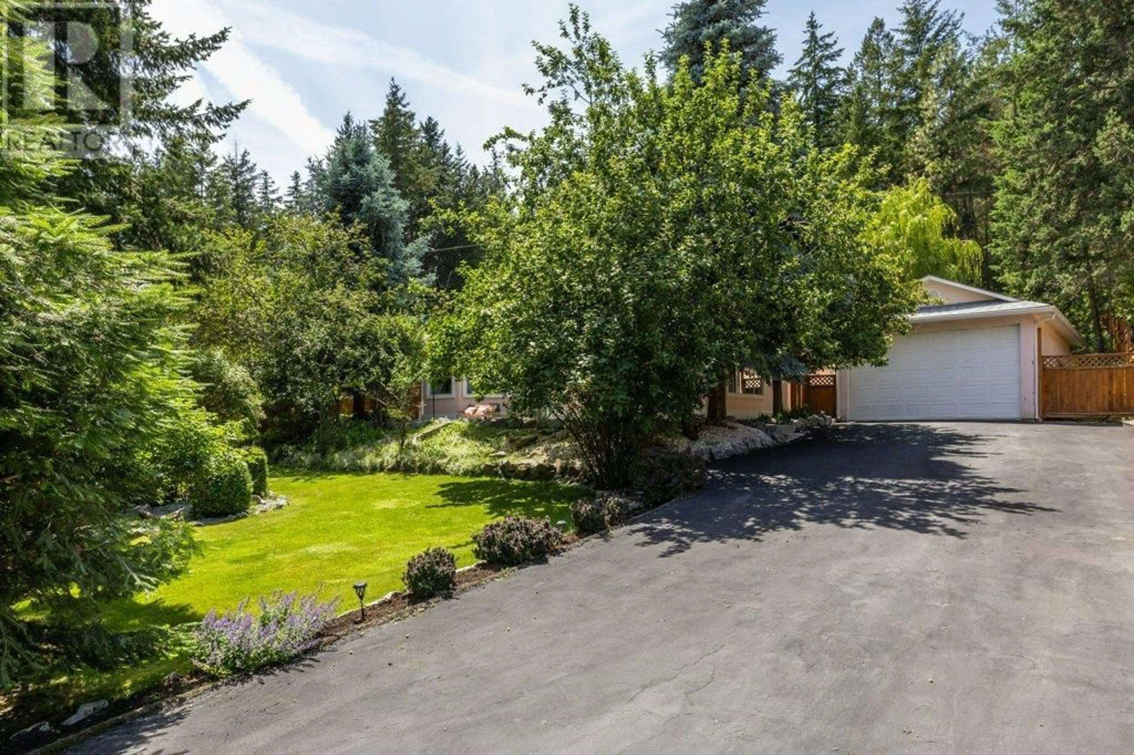 A pic from outside/outdoor area/front of a property/back of a property/a pic from drone, forest/trees view for 10724 PINECREST ROAD, Vernon British Columbia V1H2C1