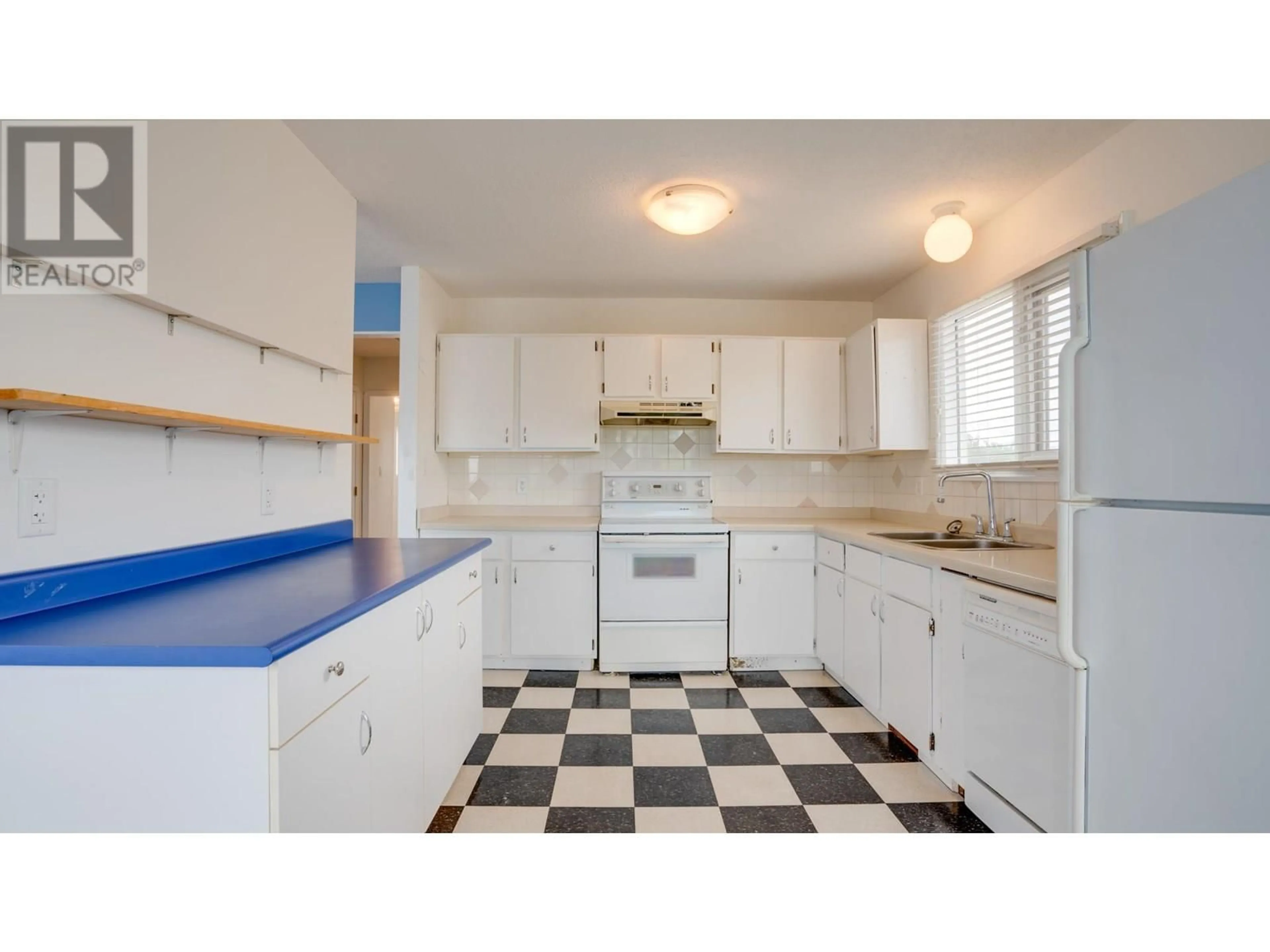 Standard kitchen, ceramic/tile floor for 4402 15 AVENUE, Vernon British Columbia V1T6X9
