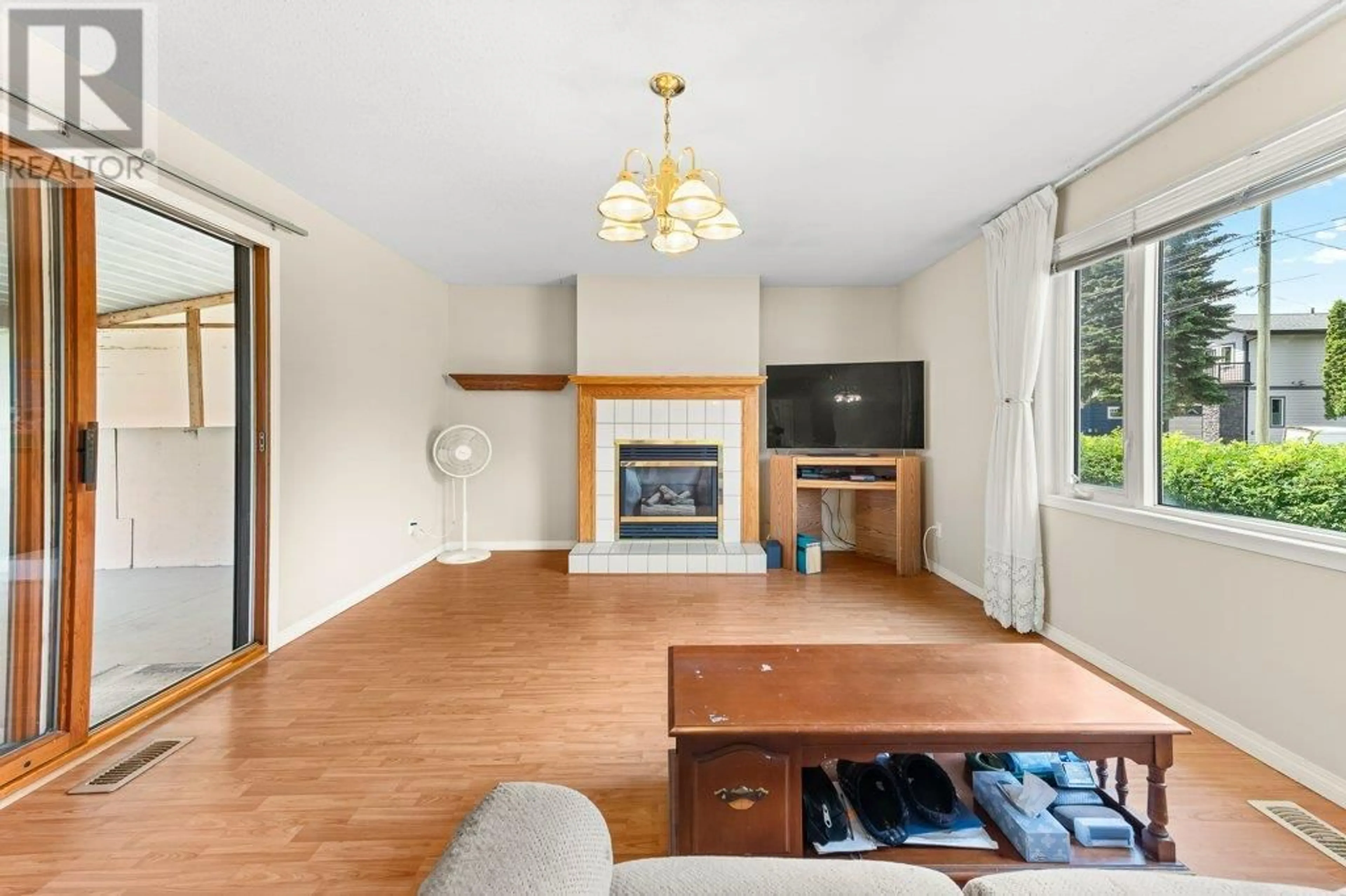 Living room with furniture, wood/laminate floor for 1292 2ND AVENUE, Fernie British Columbia V0B1M0