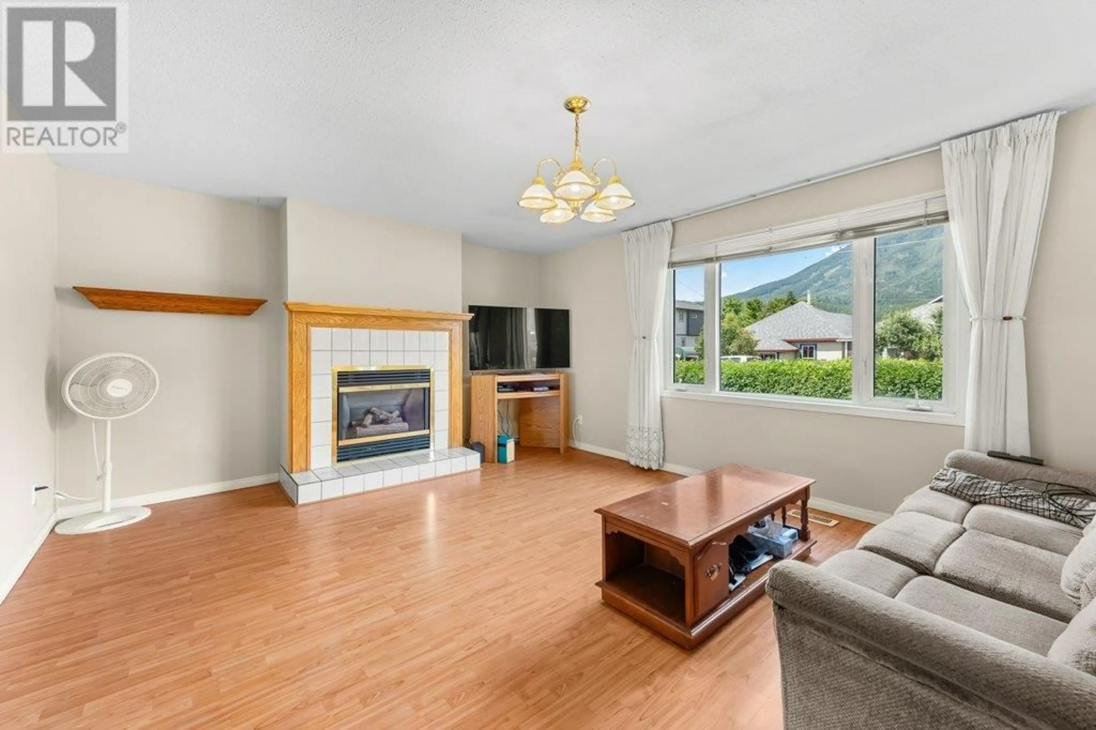 Living room with furniture, wood/laminate floor for 1292 2ND AVENUE, Fernie British Columbia V0B1M0
