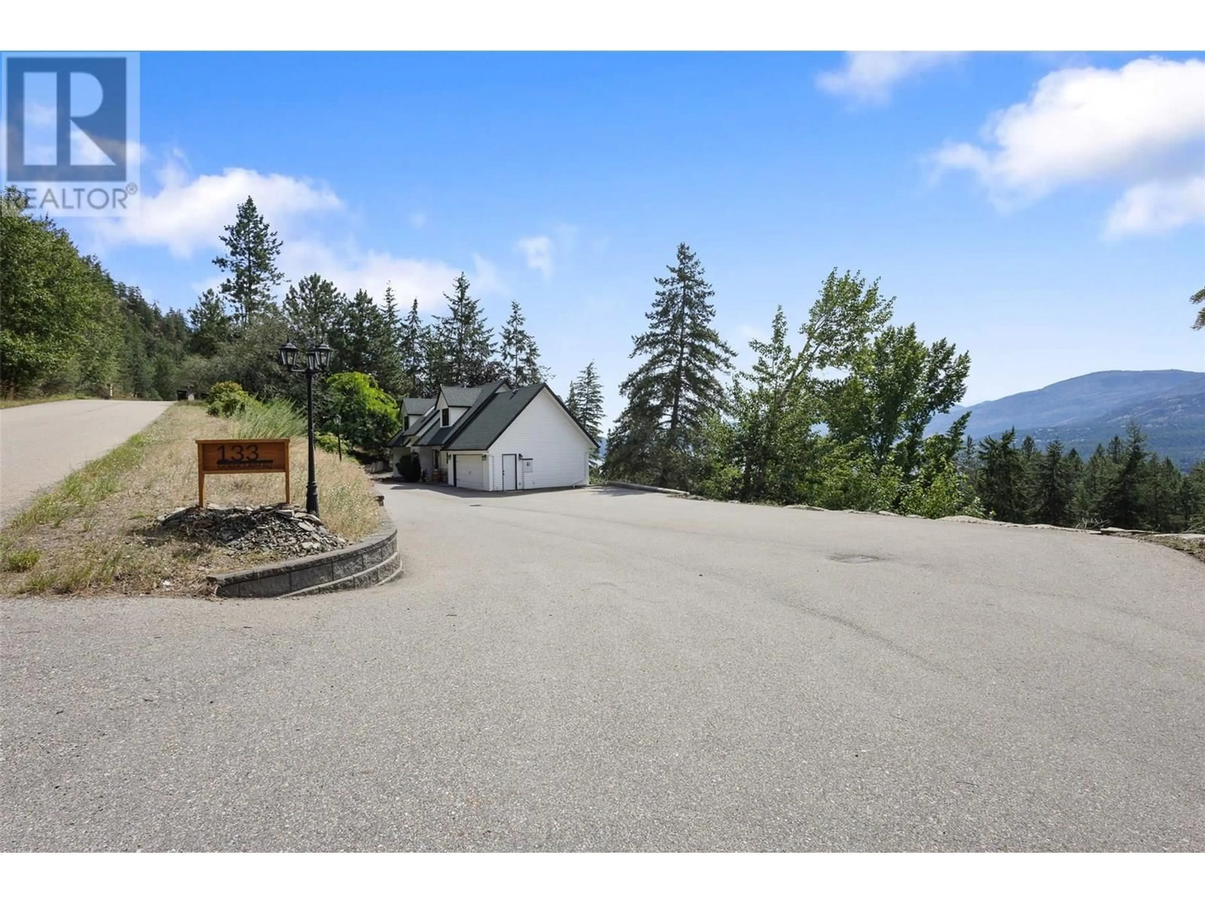 A pic from outside/outdoor area/front of a property/back of a property/a pic from drone, mountain view for 133 GOLDCLAIM ROAD, Vernon British Columbia V1H1H2