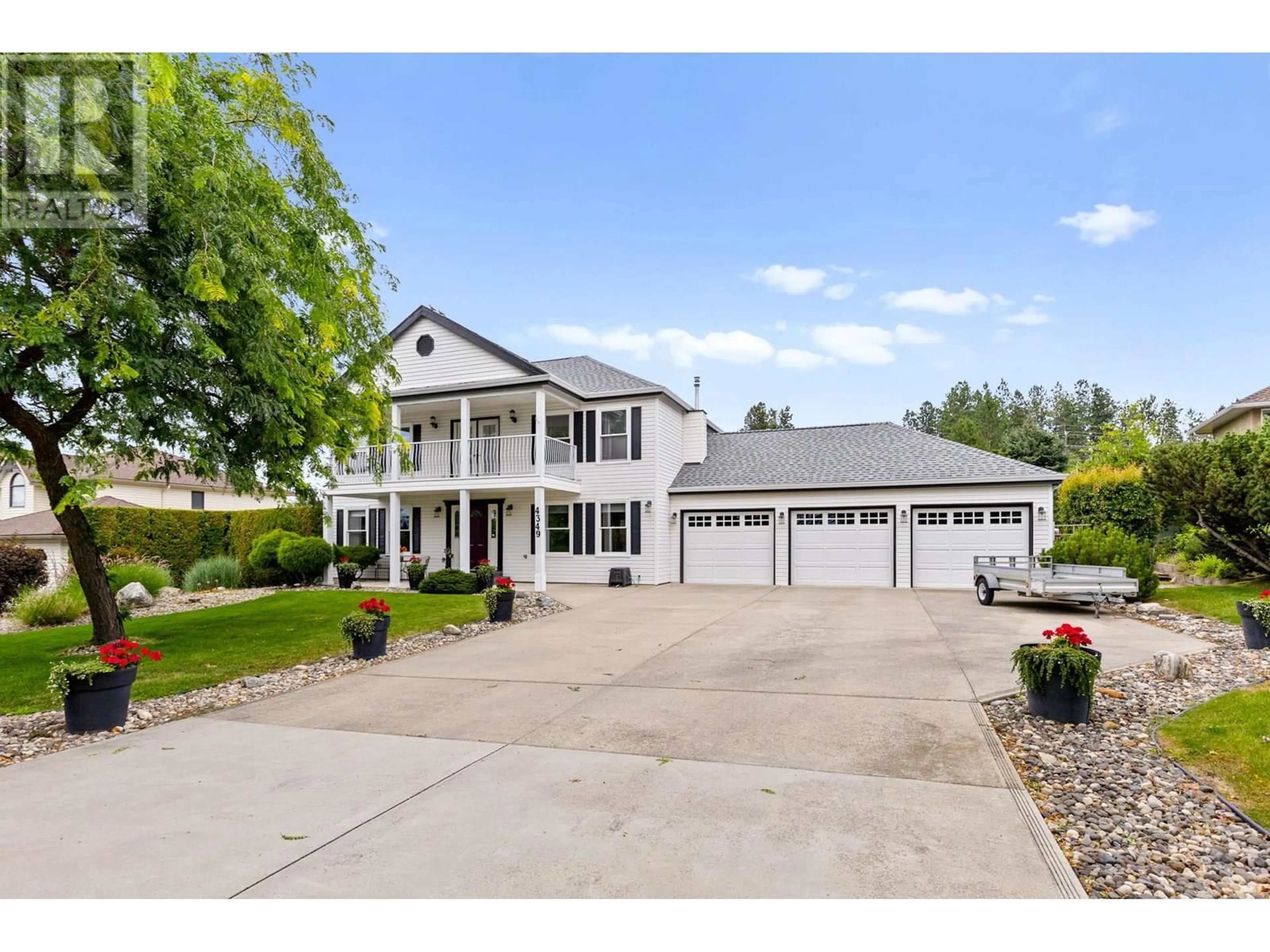 A pic from outside/outdoor area/front of a property/back of a property/a pic from drone, street for 4349 TAKLA ROAD, Kelowna British Columbia V1W3C4