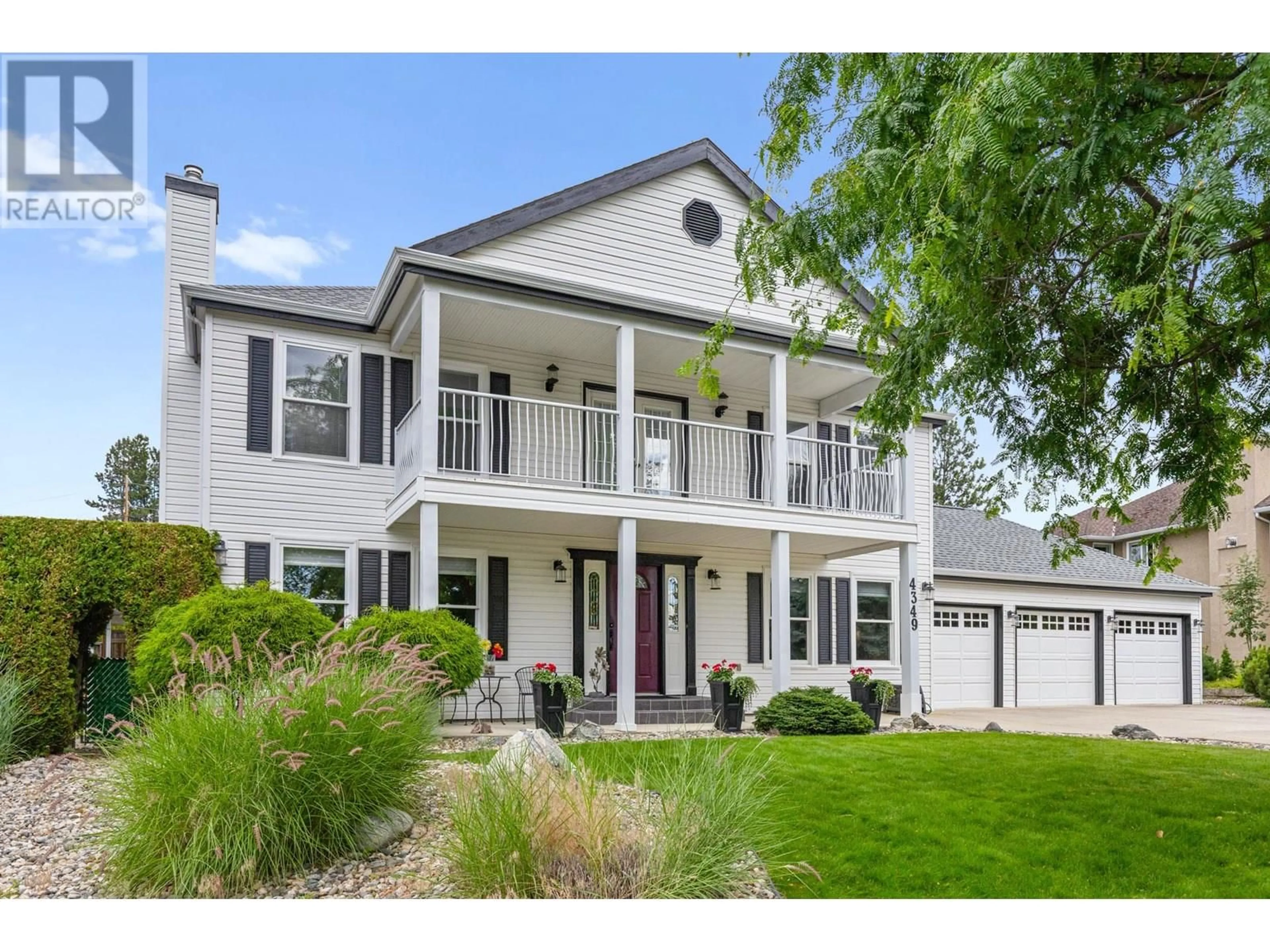 Home with vinyl exterior material, street for 4349 TAKLA ROAD, Kelowna British Columbia V1W3C4