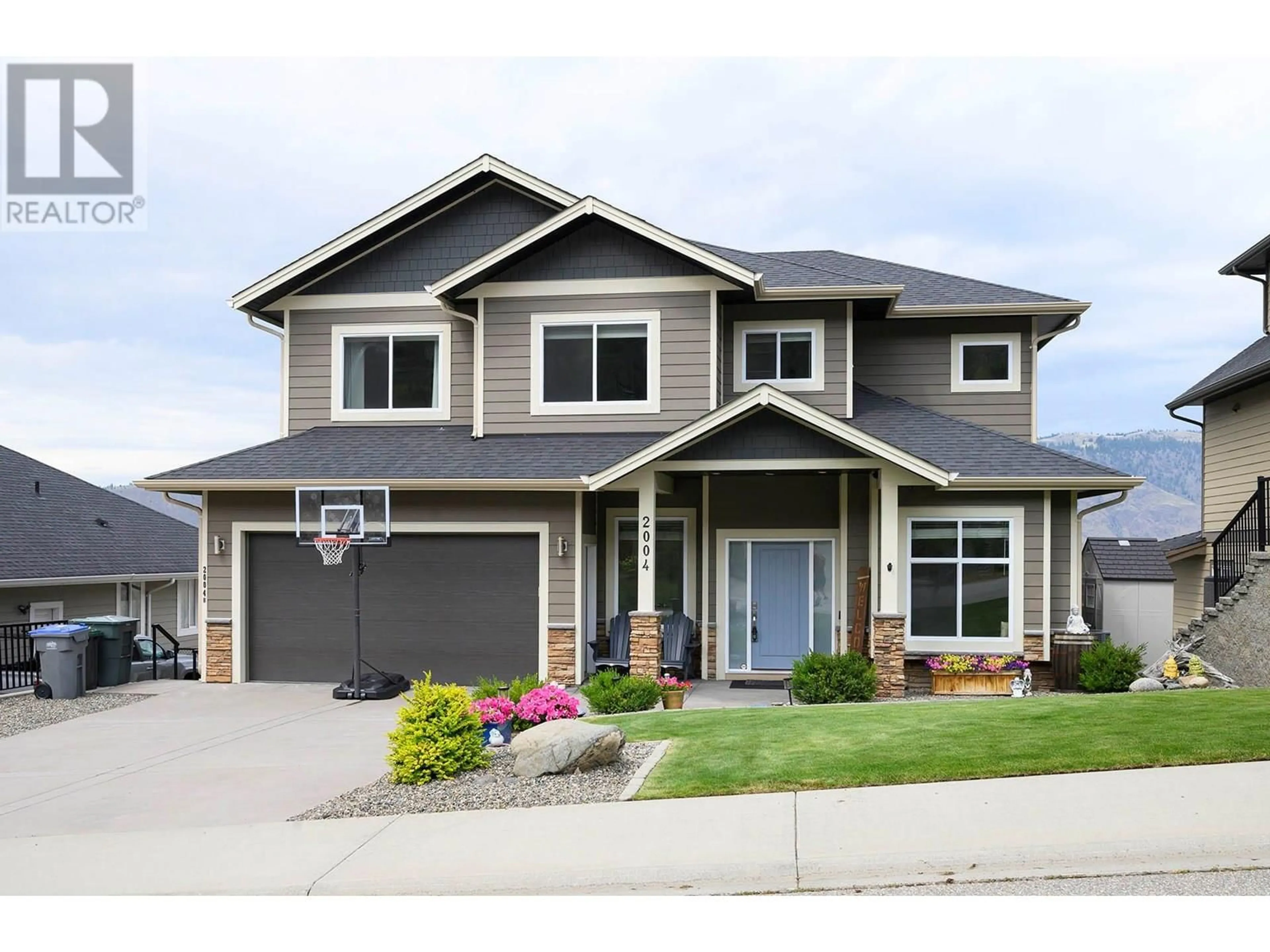 Home with vinyl exterior material, street for 2004 GALORE CRESCENT, Kamloops British Columbia V2E0A7
