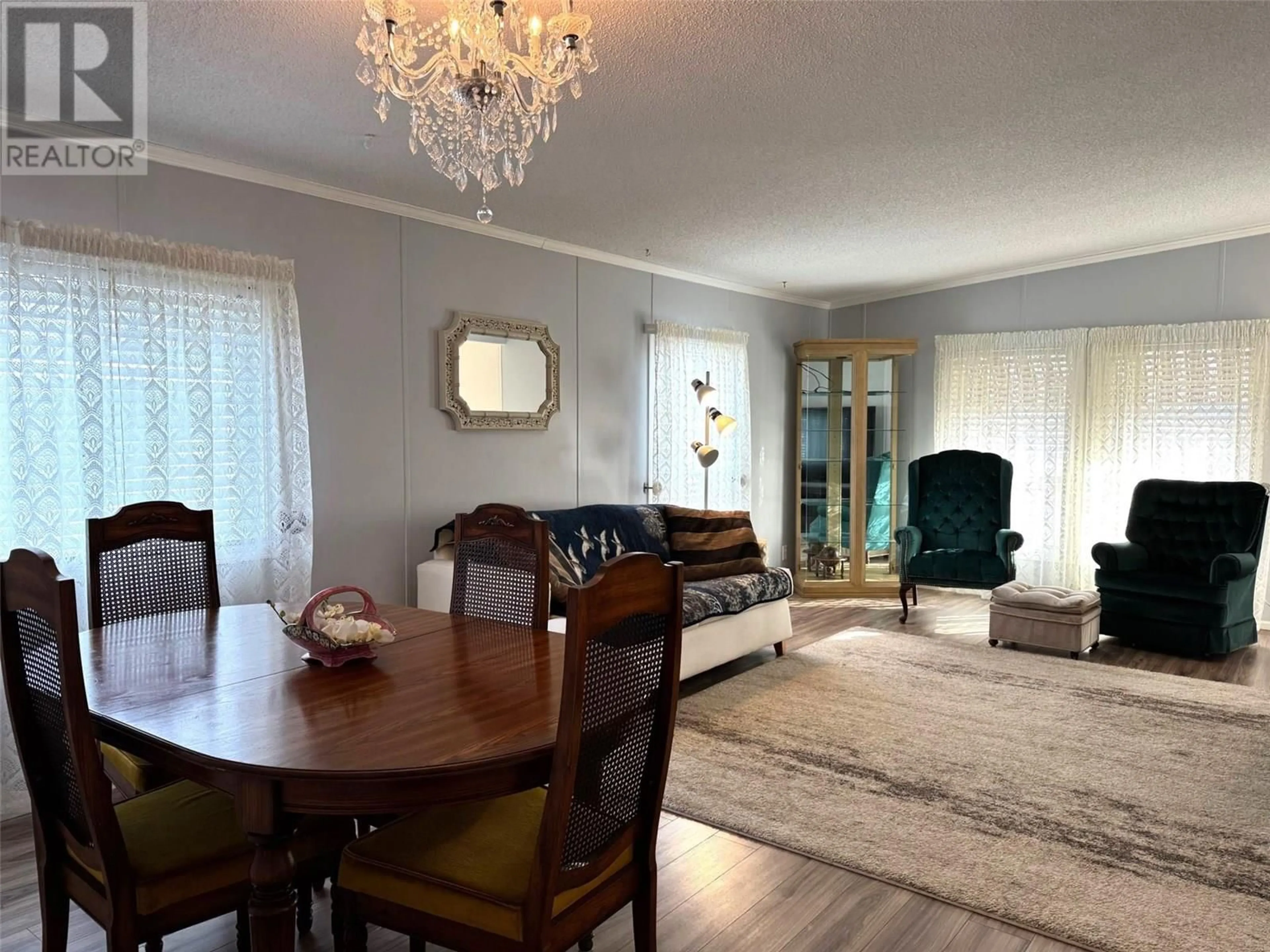 Dining room, wood/laminate floor for 128 - 1850 SHANNON LAKE ROAD, West Kelowna British Columbia V4T1L6