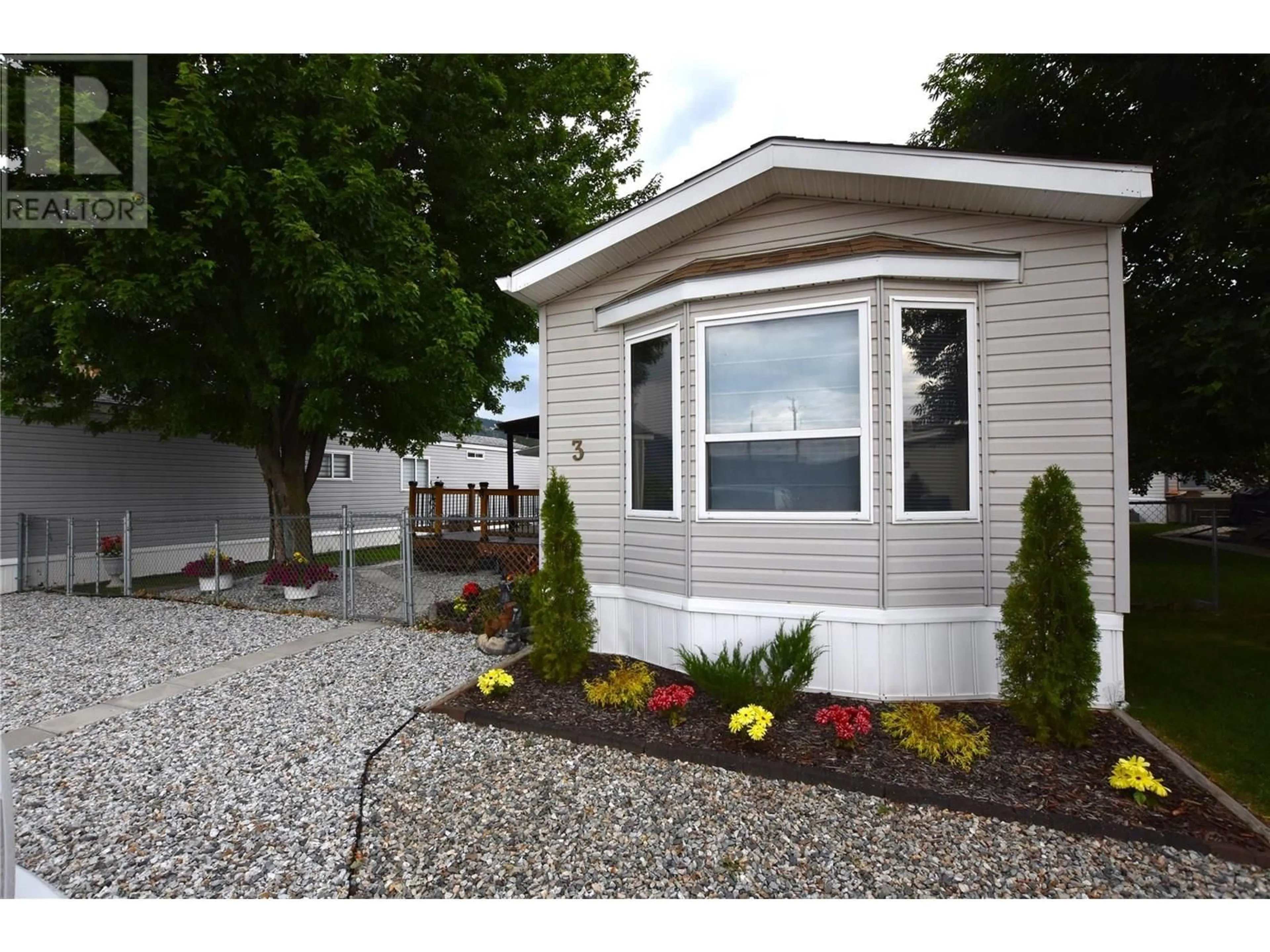 Home with vinyl exterior material, street for 3 - 12560 WESTSIDE ROAD, Vernon British Columbia V1H1S9