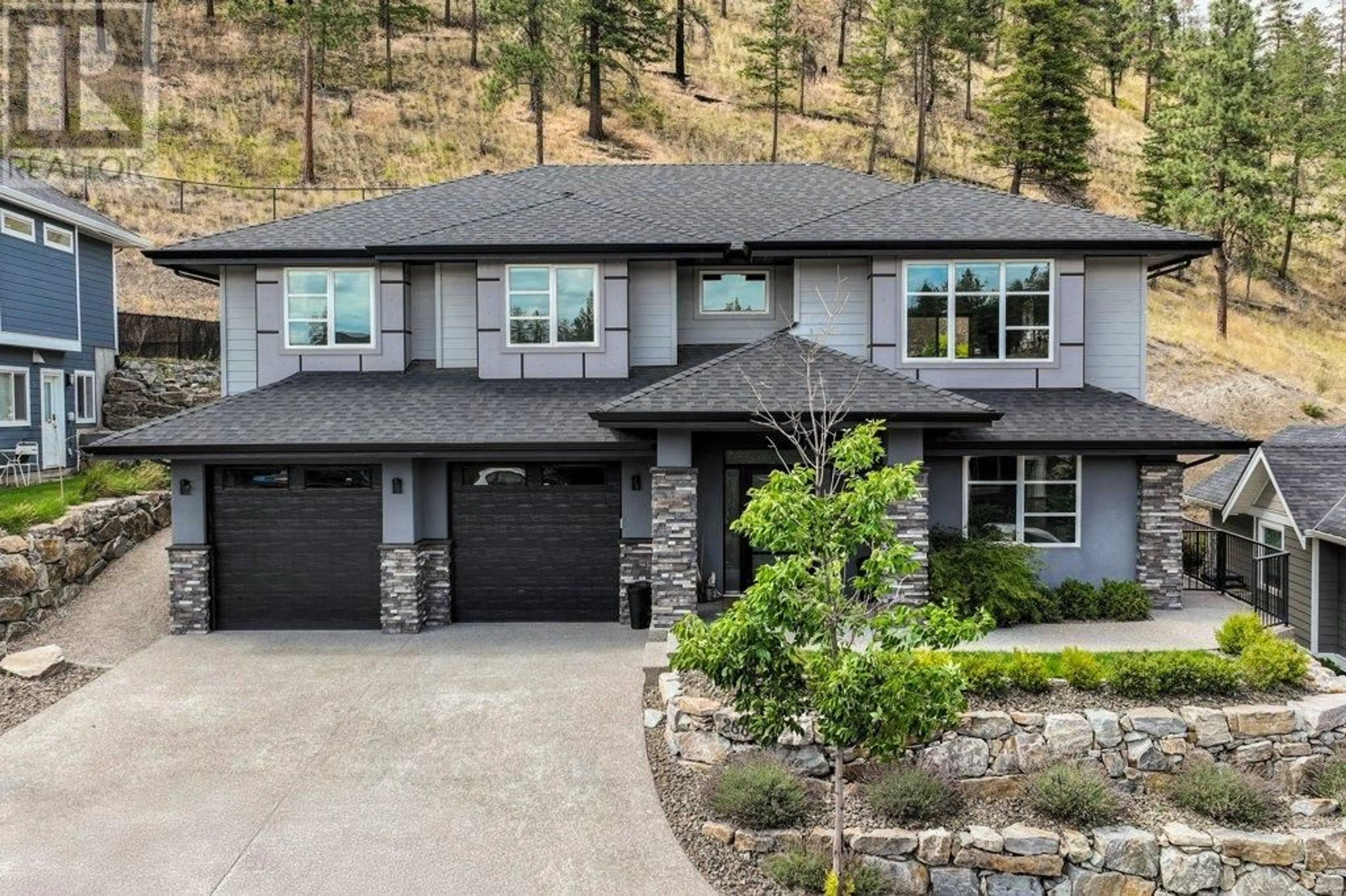Home with brick exterior material, mountain view for 288 UPPER CANYON DRIVE NORTH, Kelowna British Columbia V1V3C7