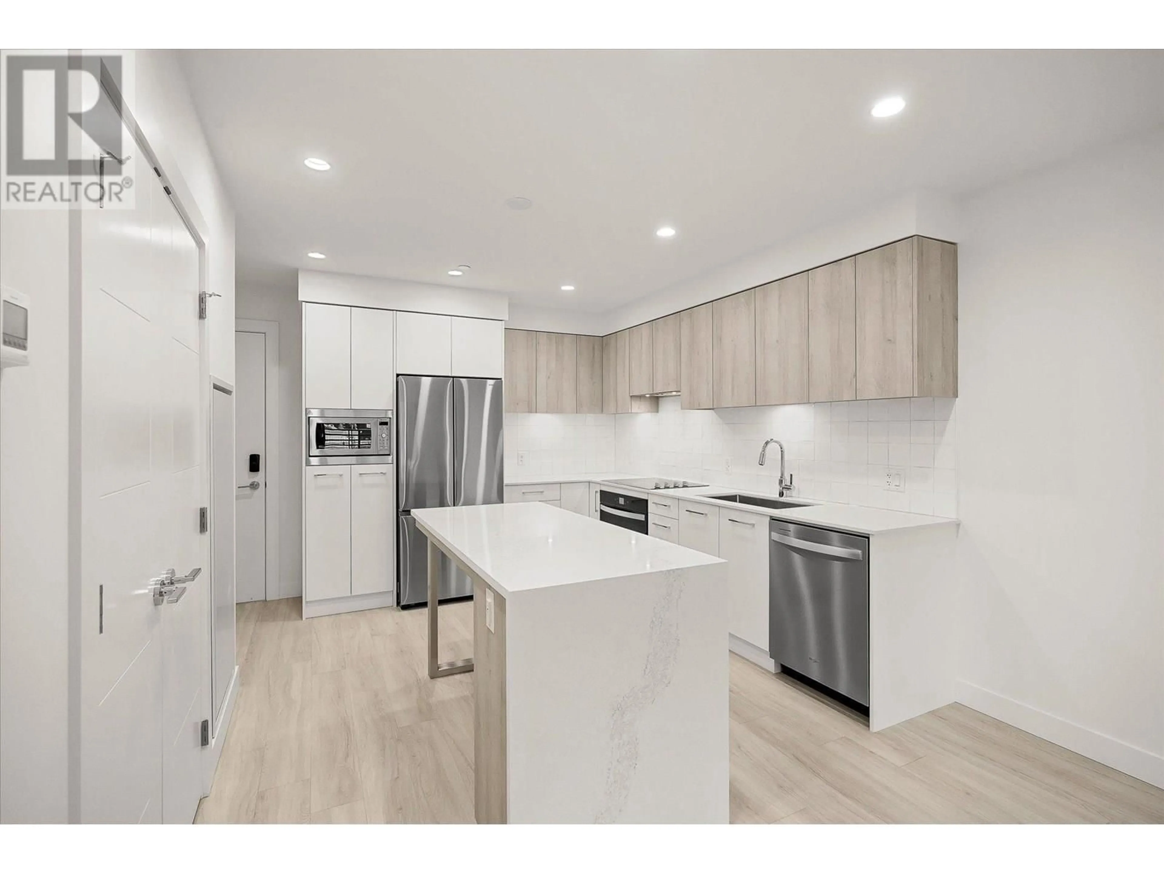 Open concept kitchen, unknown for 108 - 3699 CAPOZZI ROAD, Kelowna British Columbia V1W0G3