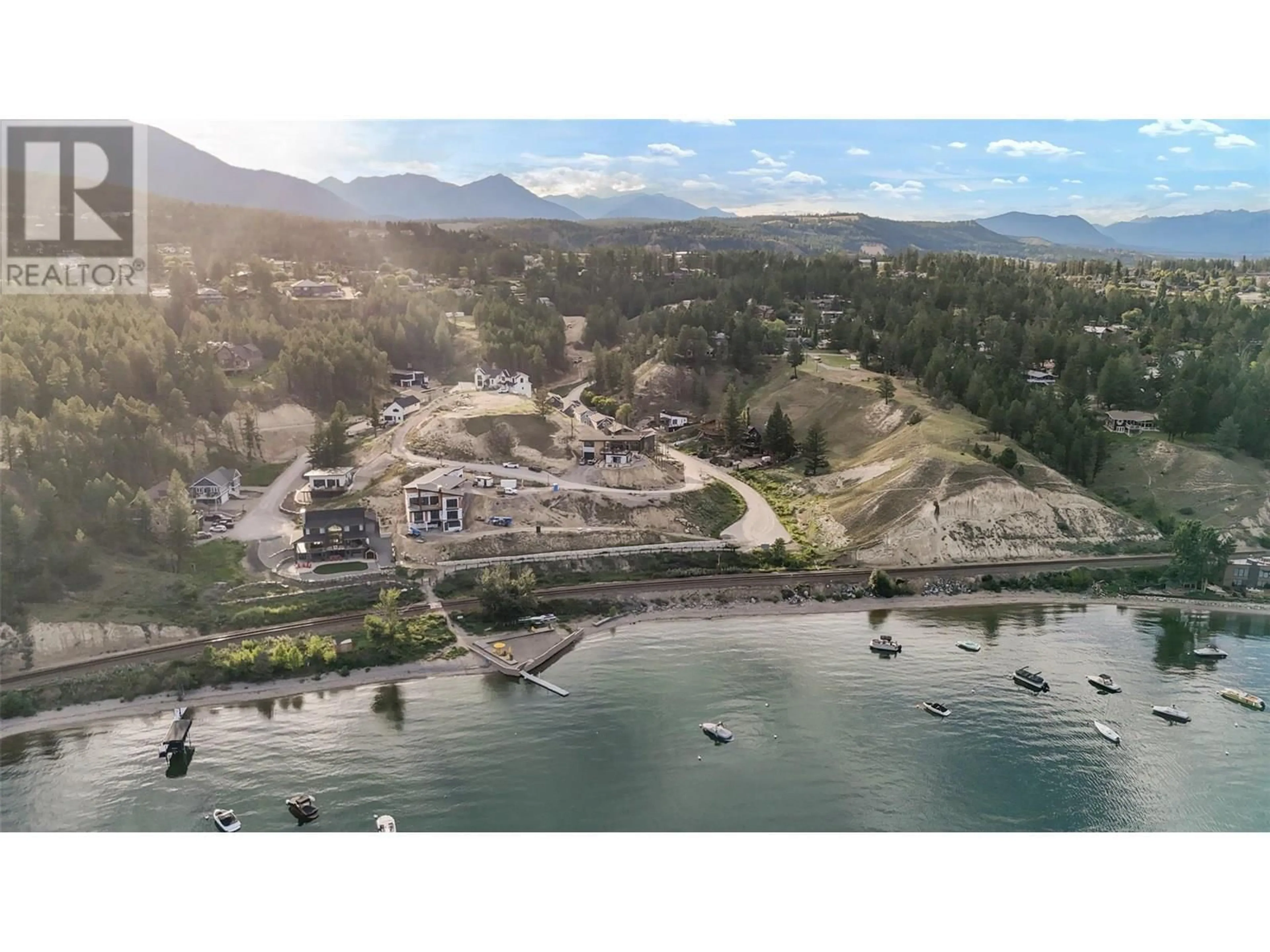 A pic from outside/outdoor area/front of a property/back of a property/a pic from drone, water/lake/river/ocean view for 726 TAYNTON DRIVE, Invermere British Columbia V0A1K6