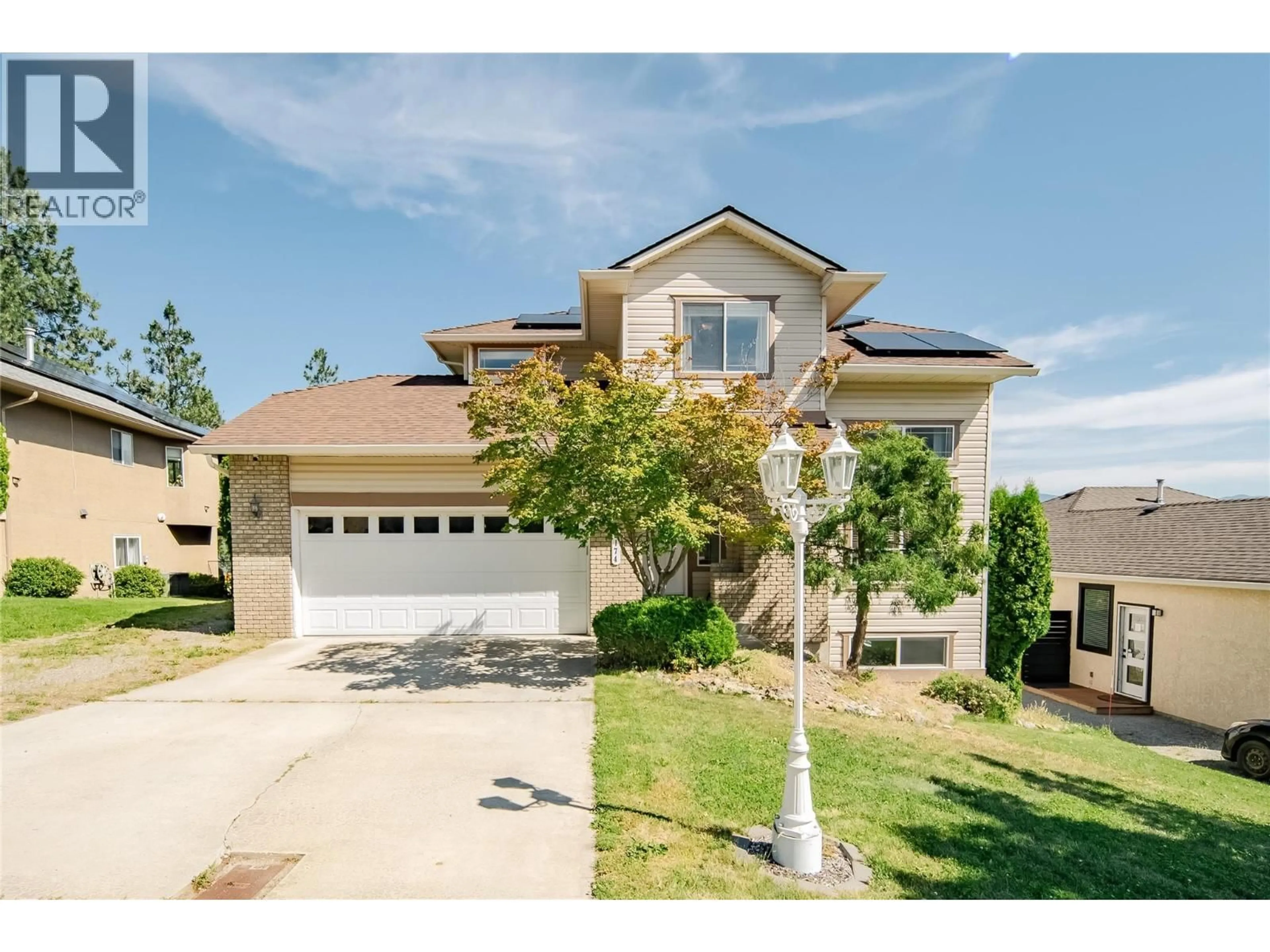 Home with vinyl exterior material, street for 2174 SUNVIEW DRIVE, Kelowna British Columbia V1Z3R2
