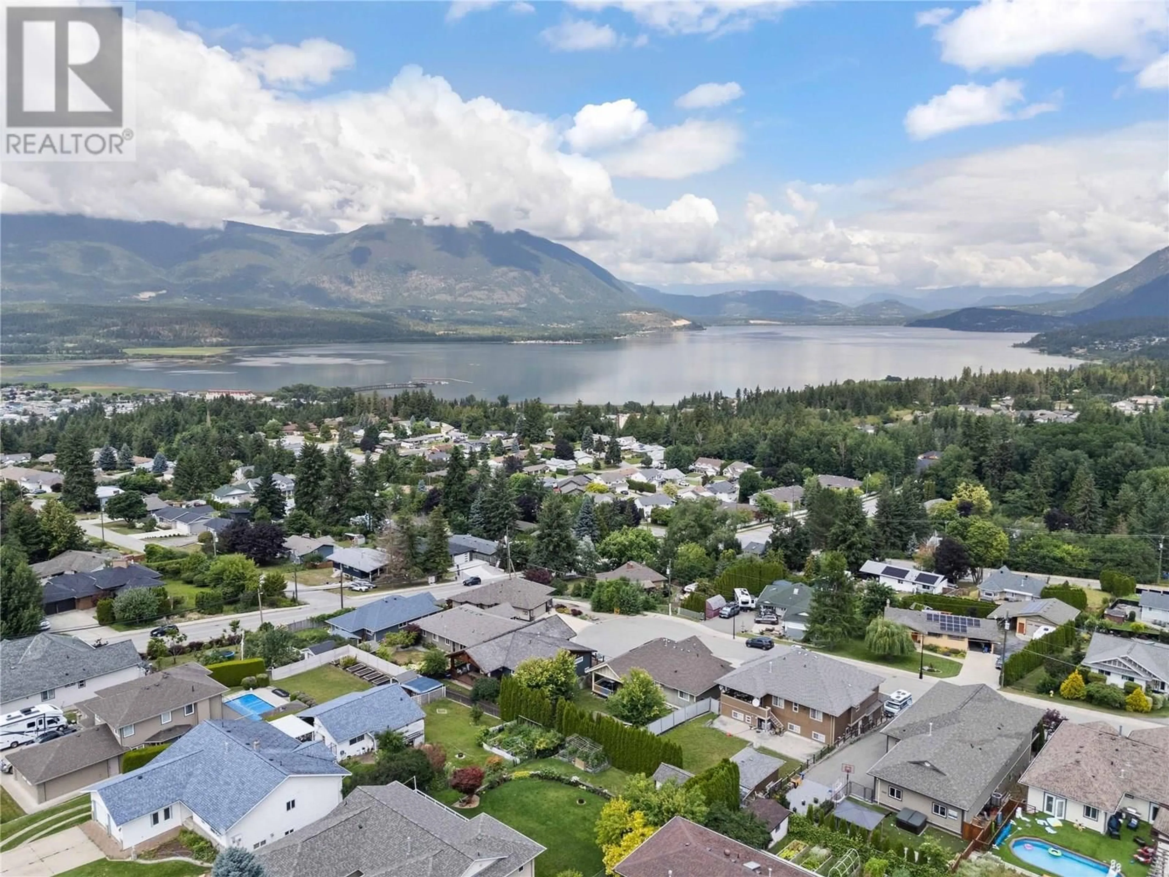 A pic from outside/outdoor area/front of a property/back of a property/a pic from drone, mountain view for 2070 1 AVENUE SOUTHEAST, Salmon Arm British Columbia V1E1K1
