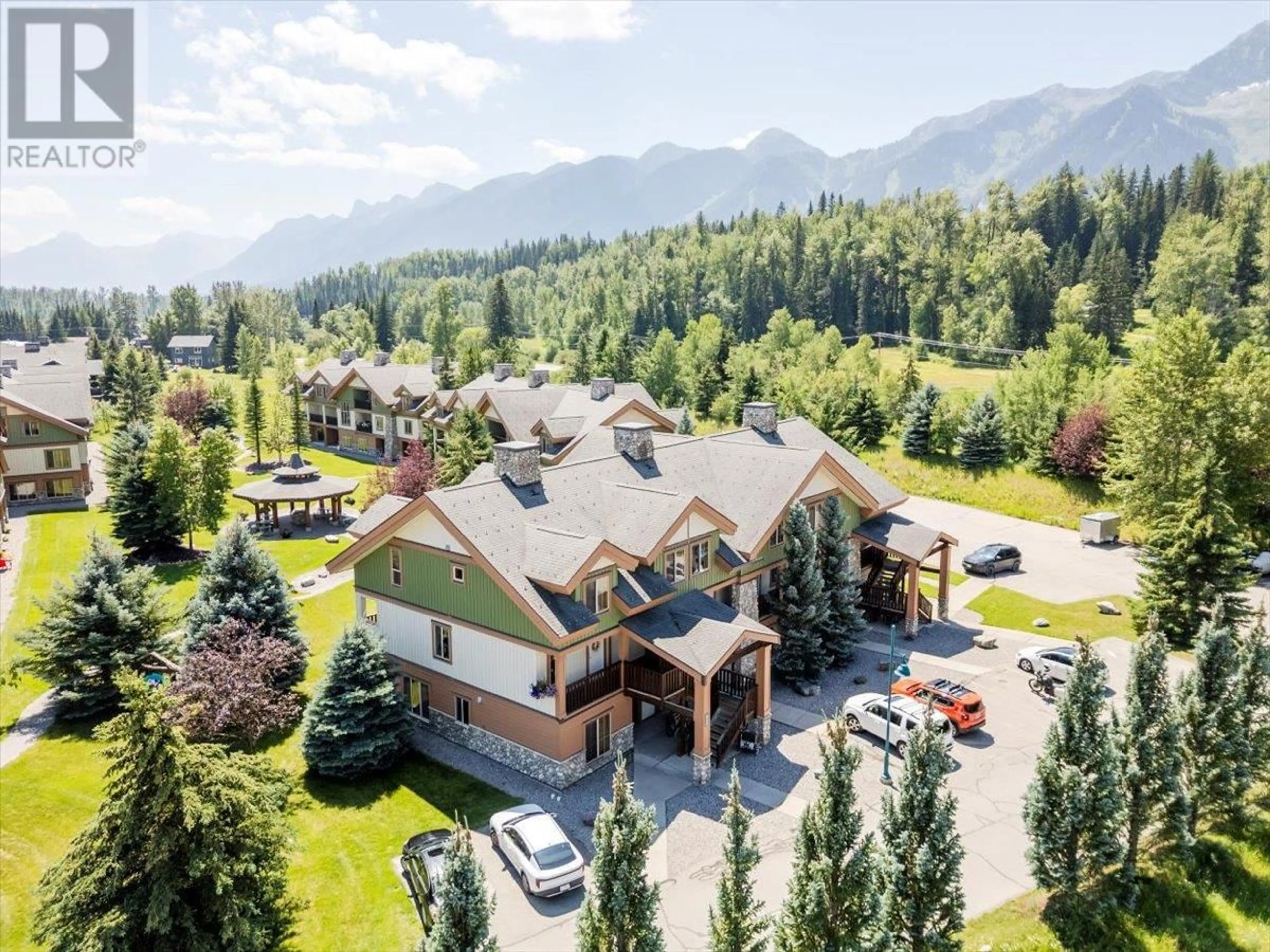 A pic from outside/outdoor area/front of a property/back of a property/a pic from drone, mountain view for 101 - 32 RIVERMOUNT PLACE, Fernie British Columbia V0B1M7