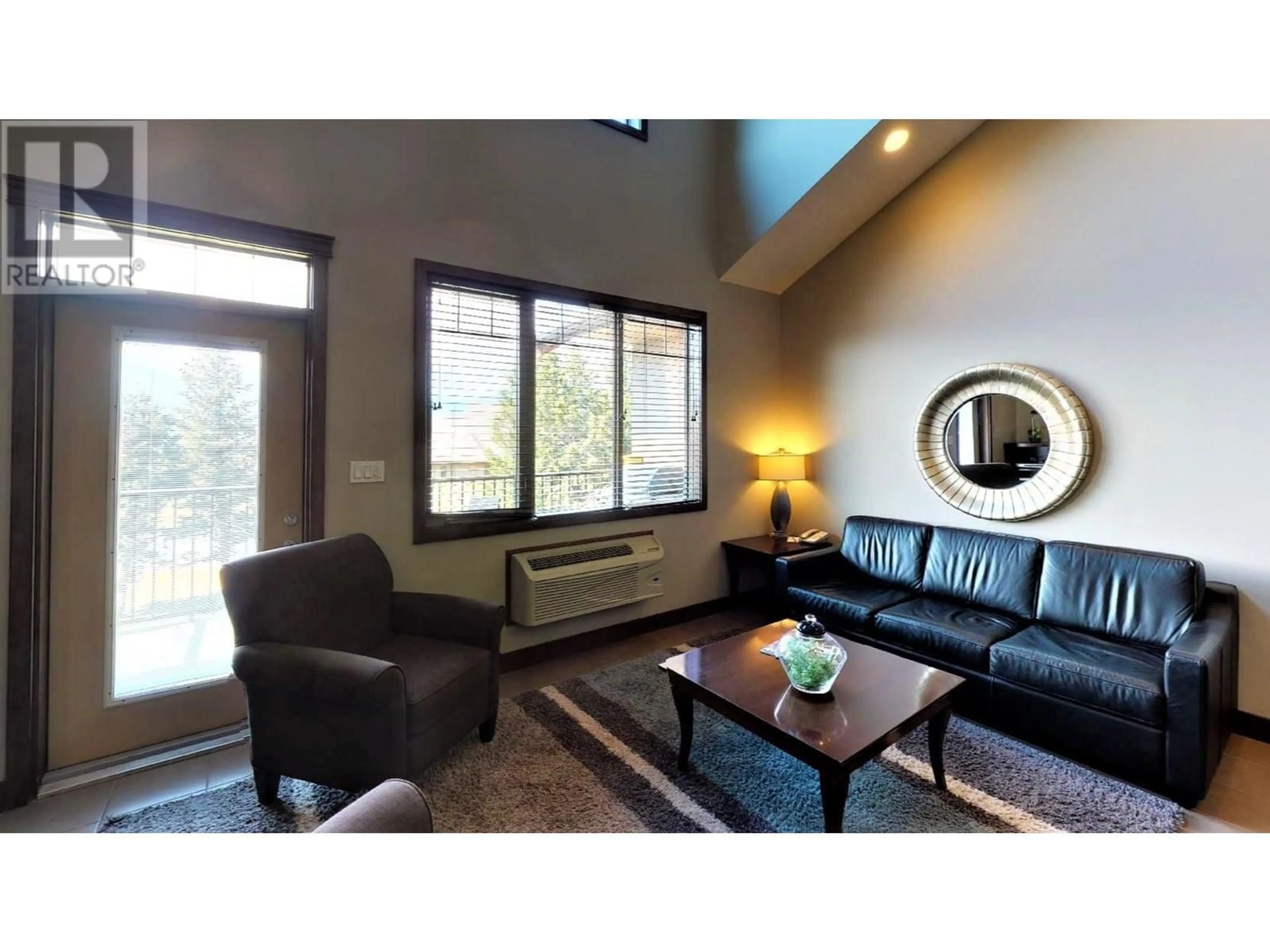 Living room with furniture, wood/laminate floor for 735 H - 700 BIGHORN BOULEVARD, Radium Hot Springs British Columbia V0A1M0