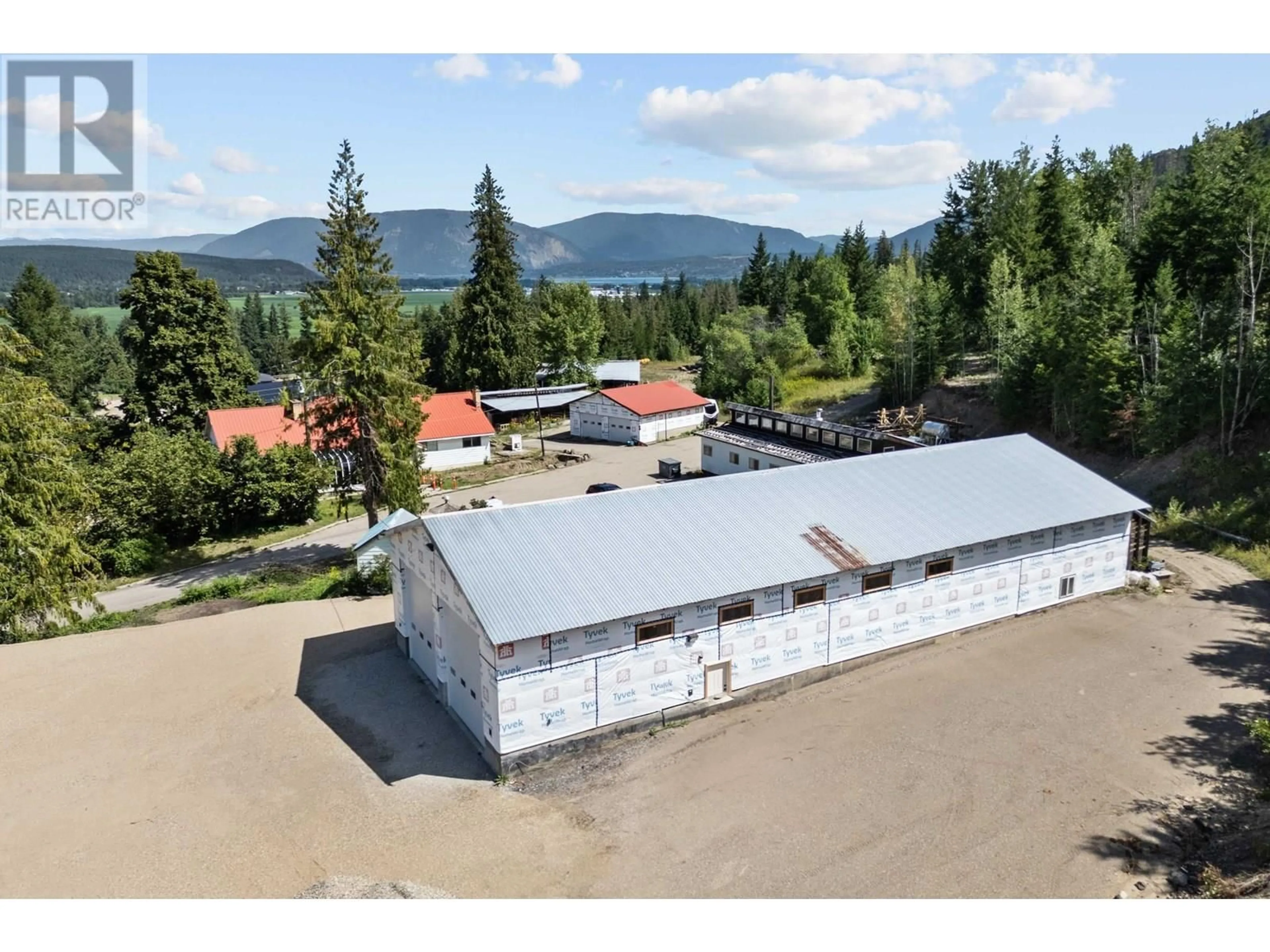A pic from outside/outdoor area/front of a property/back of a property/a pic from drone, mountain view for 4900 45 STREET SOUTHWEST, Salmon Arm British Columbia V1E3C1