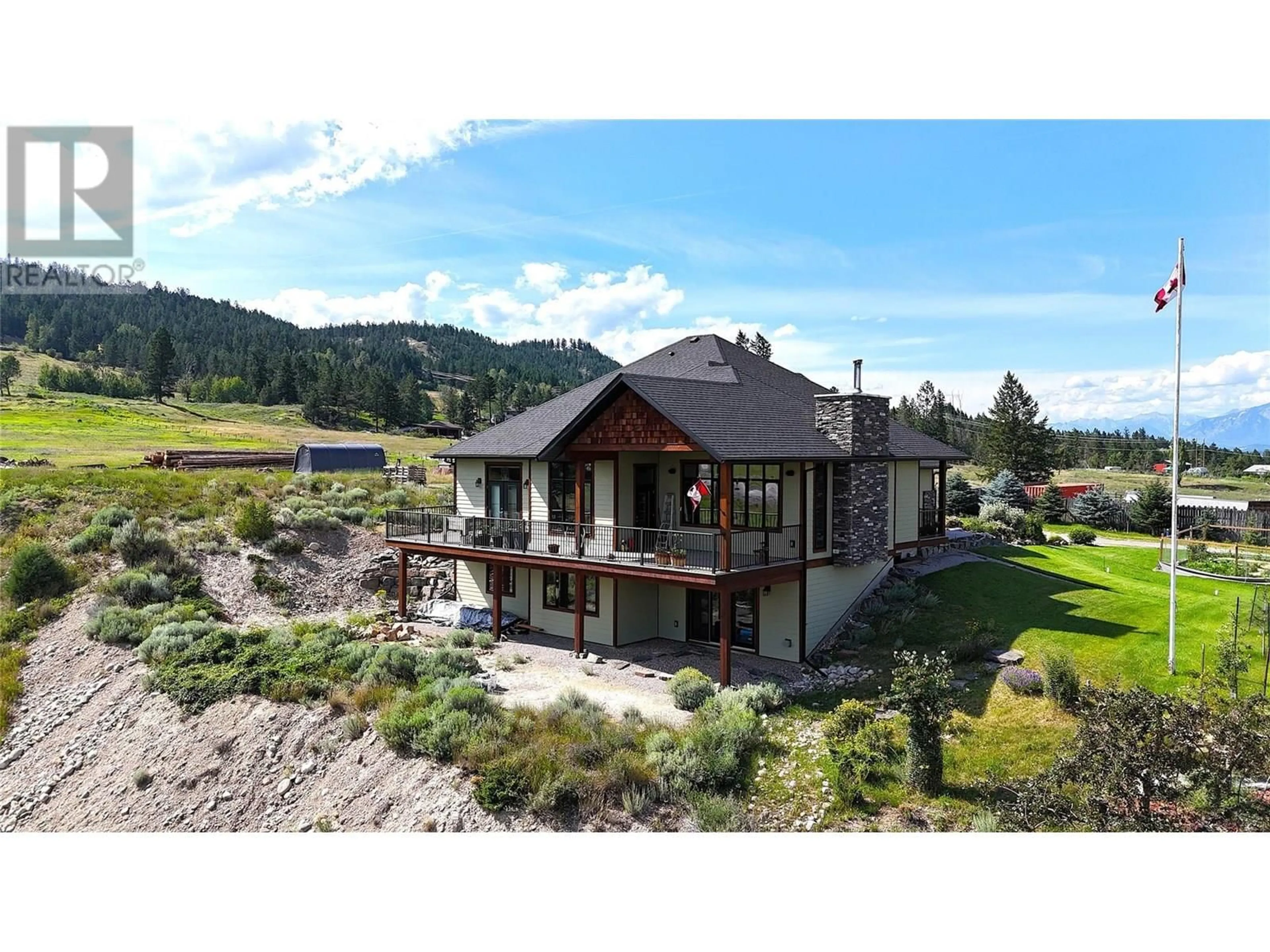 A pic from outside/outdoor area/front of a property/back of a property/a pic from drone, water/lake/river/ocean view for 129 WESTSIDE ROAD, Invermere British Columbia V0A1K5