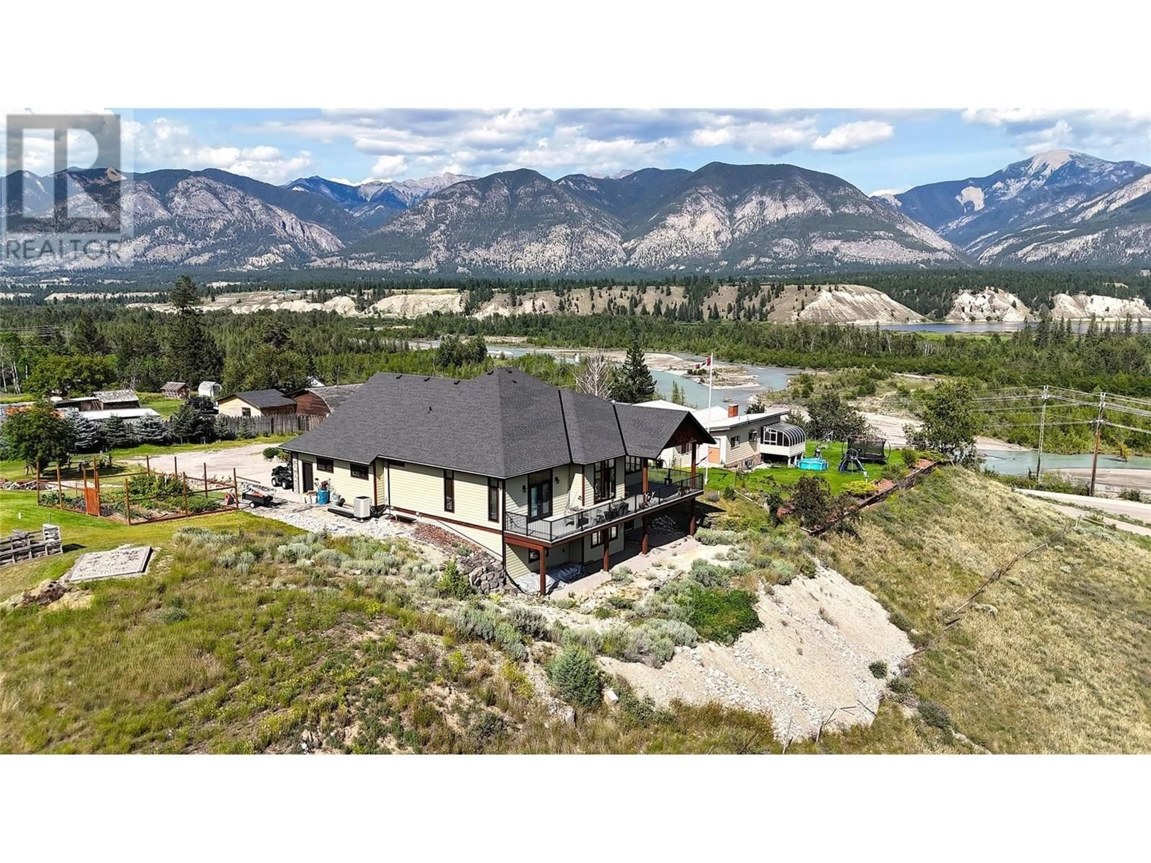 A pic from outside/outdoor area/front of a property/back of a property/a pic from drone, mountain view for 129 WESTSIDE ROAD, Invermere British Columbia V0A1K5