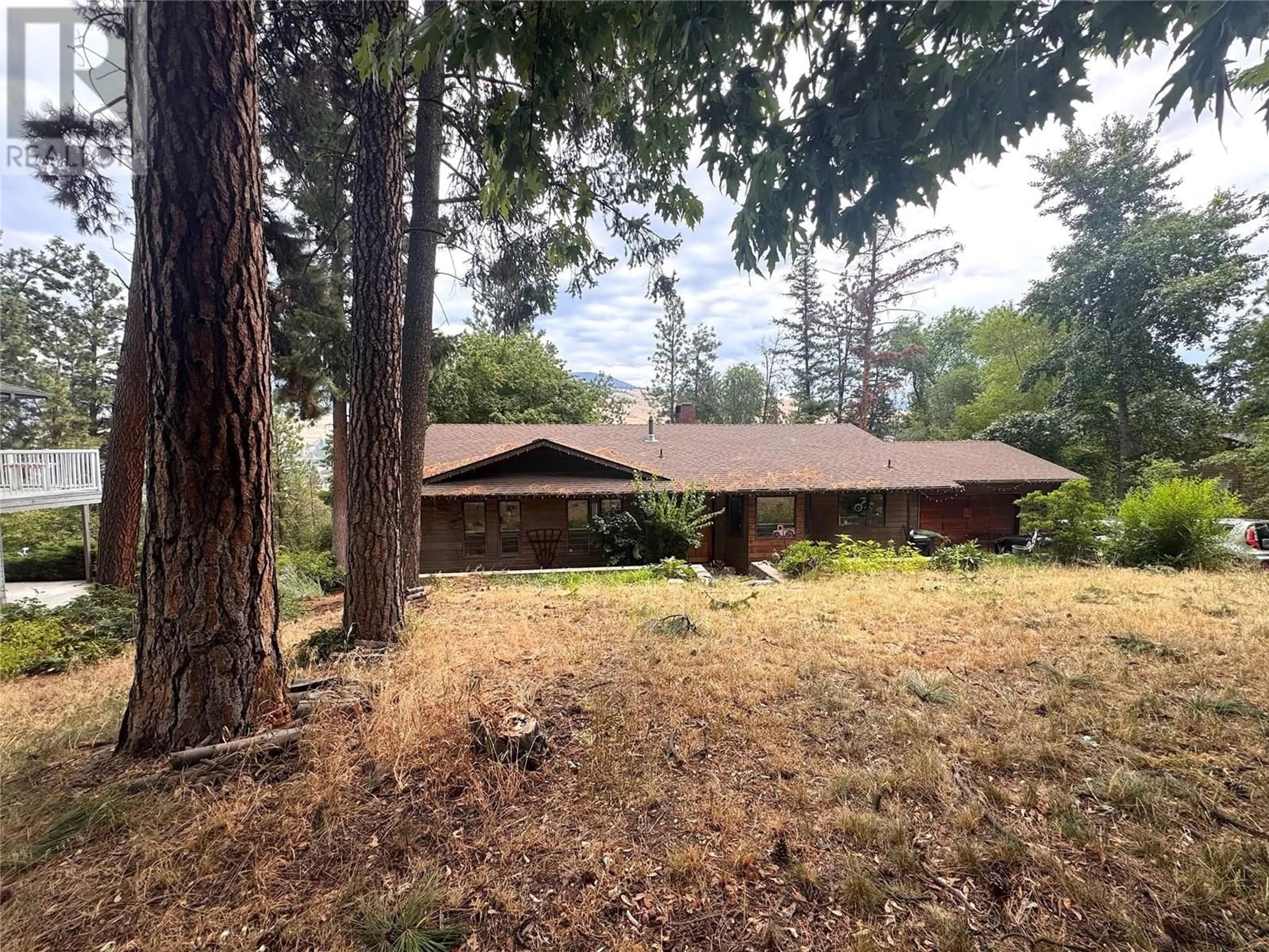 A pic from outside/outdoor area/front of a property/back of a property/a pic from drone, forest/trees view for 10959 EVA ROAD, Lake Country British Columbia V4V1H4