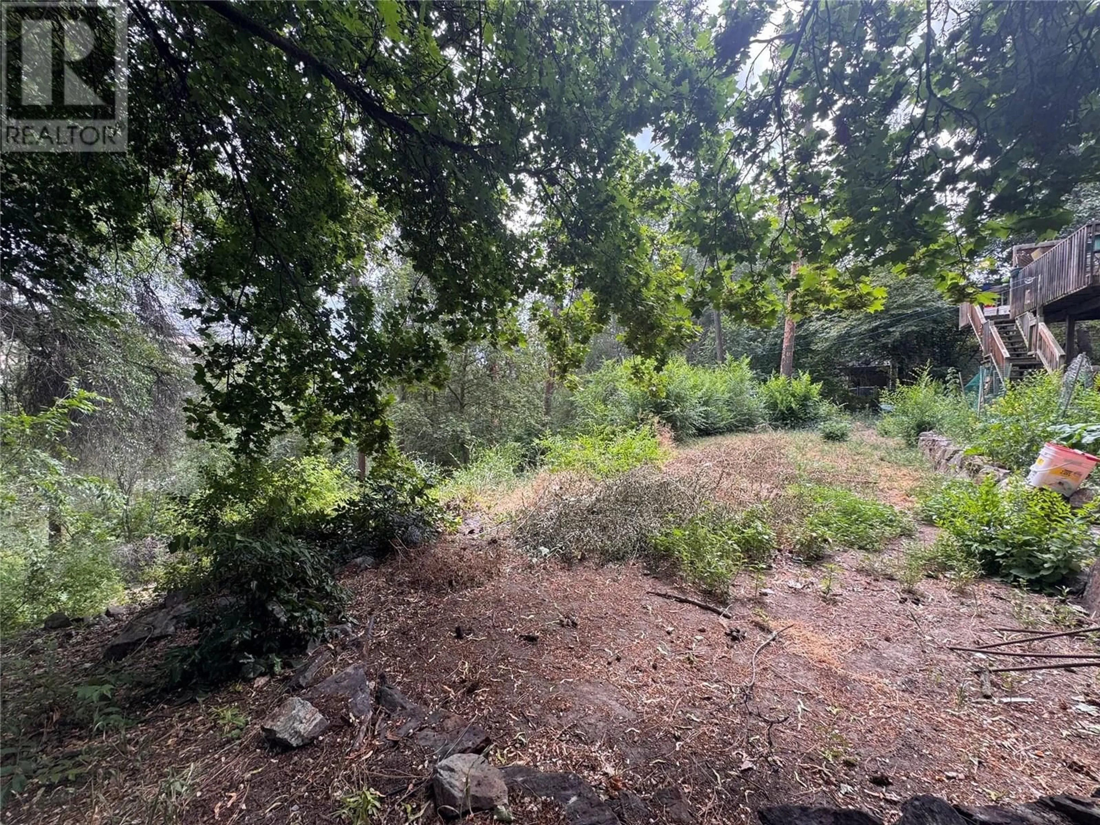 A pic from outside/outdoor area/front of a property/back of a property/a pic from drone, forest/trees view for 10959 EVA ROAD, Lake Country British Columbia V4V1H4