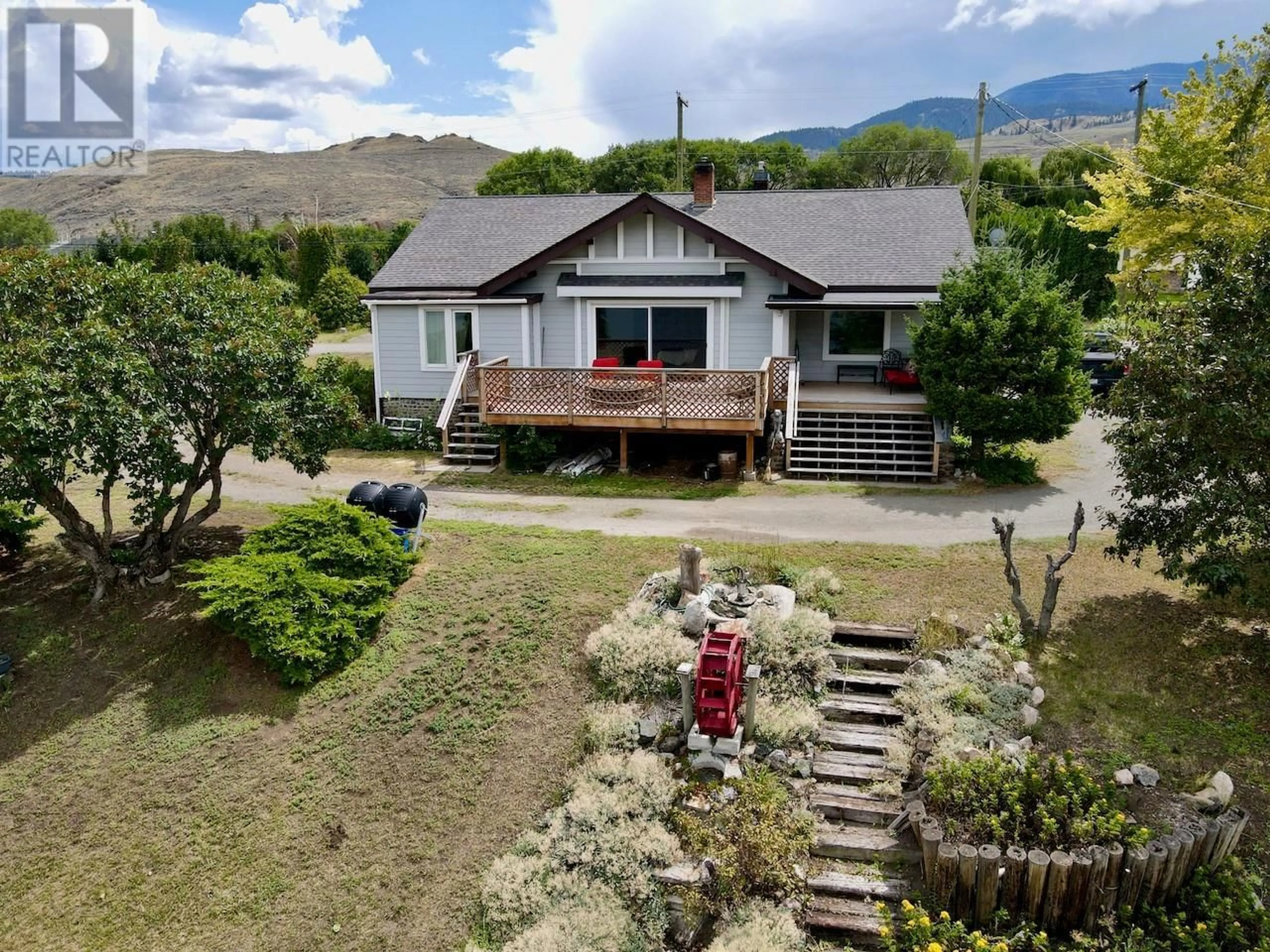 A pic from outside/outdoor area/front of a property/back of a property/a pic from drone, mountain view for 7011 SAVONA ACCESS ROAD, Kamloops British Columbia V0K2J0