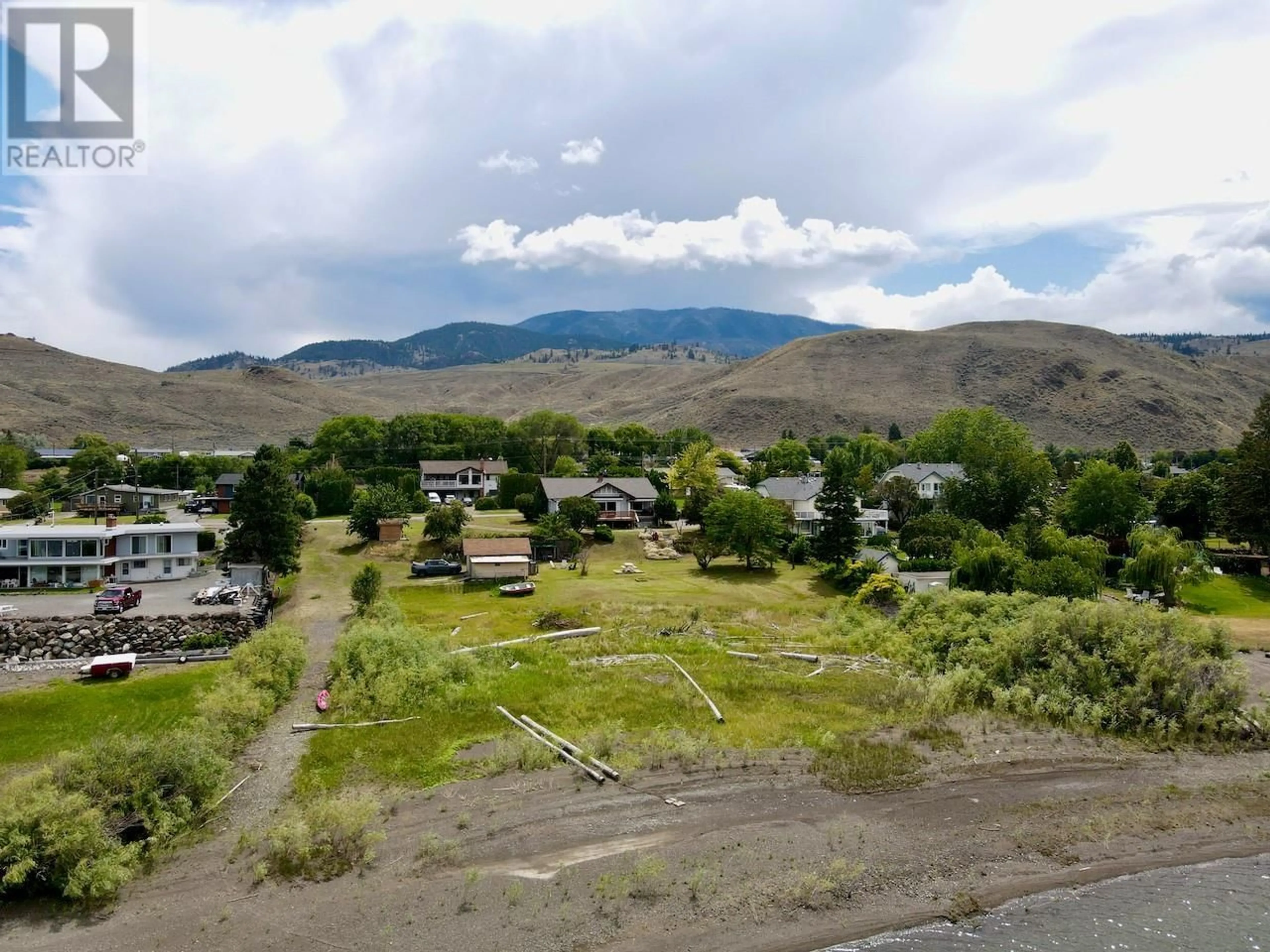 A pic from outside/outdoor area/front of a property/back of a property/a pic from drone, mountain view for 7011 SAVONA ACCESS ROAD, Kamloops British Columbia V0K2J0