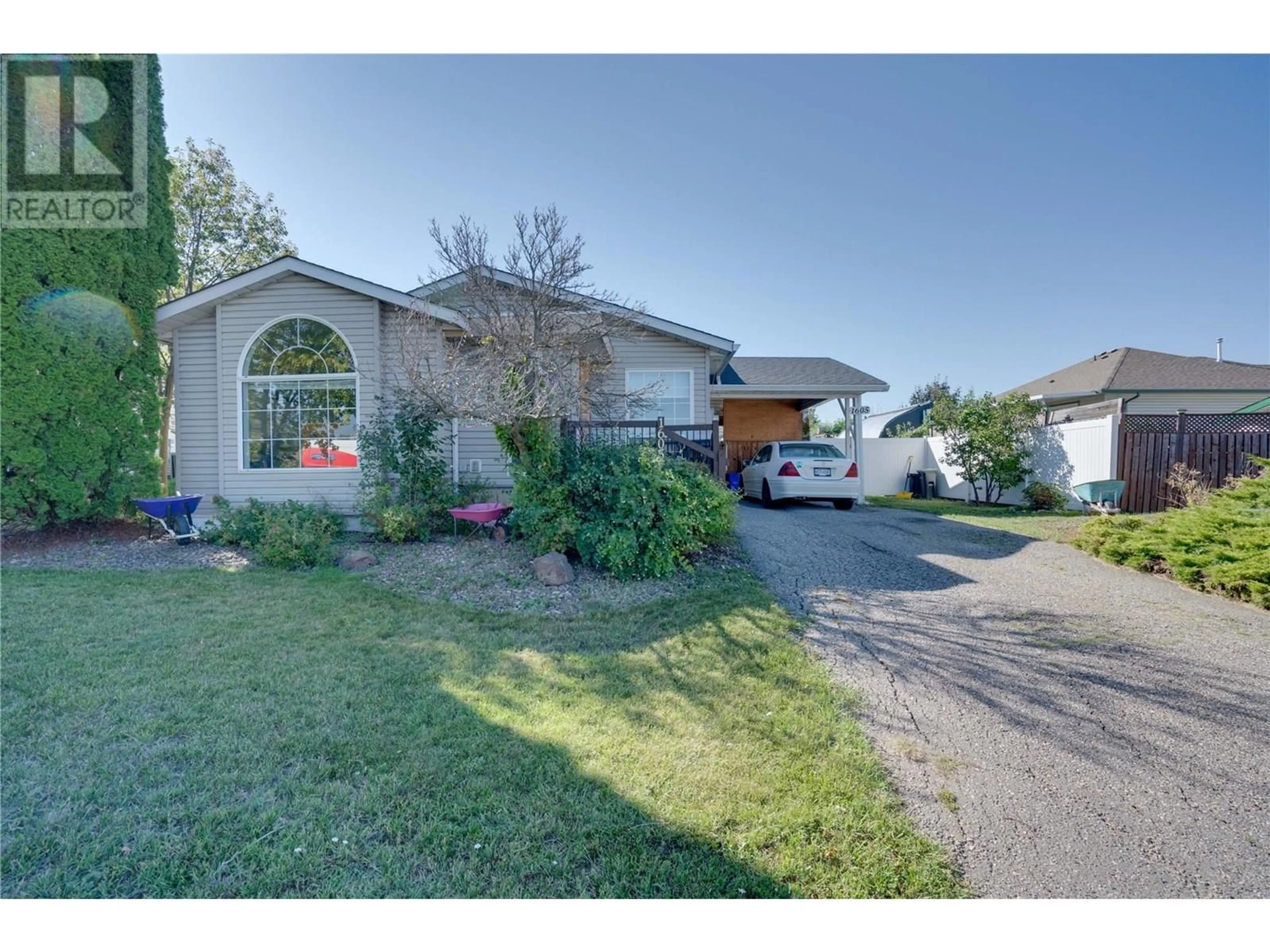 A pic from outside/outdoor area/front of a property/back of a property/a pic from drone, street for 1605 15 AVENUE, Vernon British Columbia V1T9R4