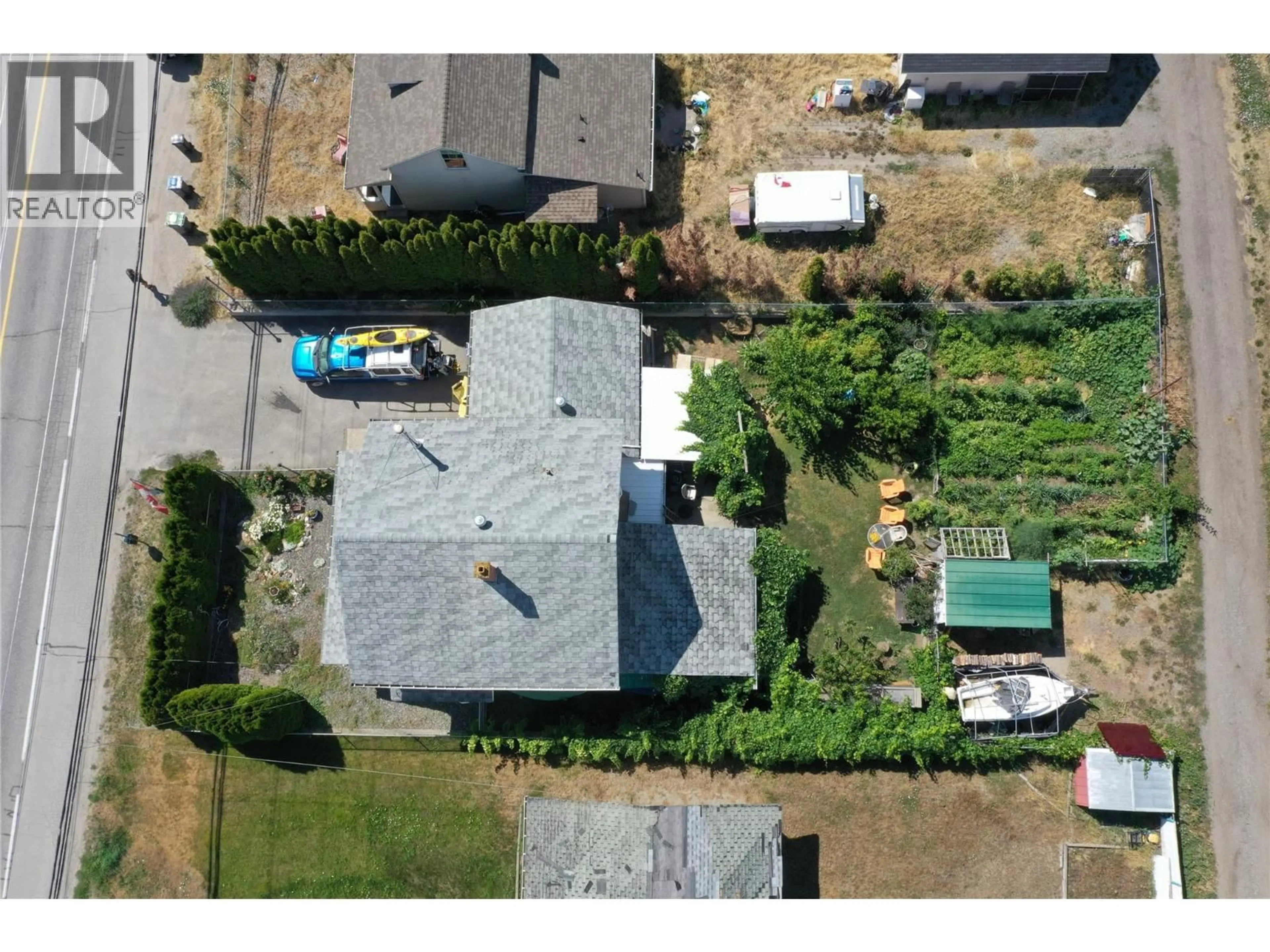 A pic from outside/outdoor area/front of a property/back of a property/a pic from drone, street for 3570 OLD OKANAGAN HIGHWAY, West Kelowna British Columbia V4T1P3