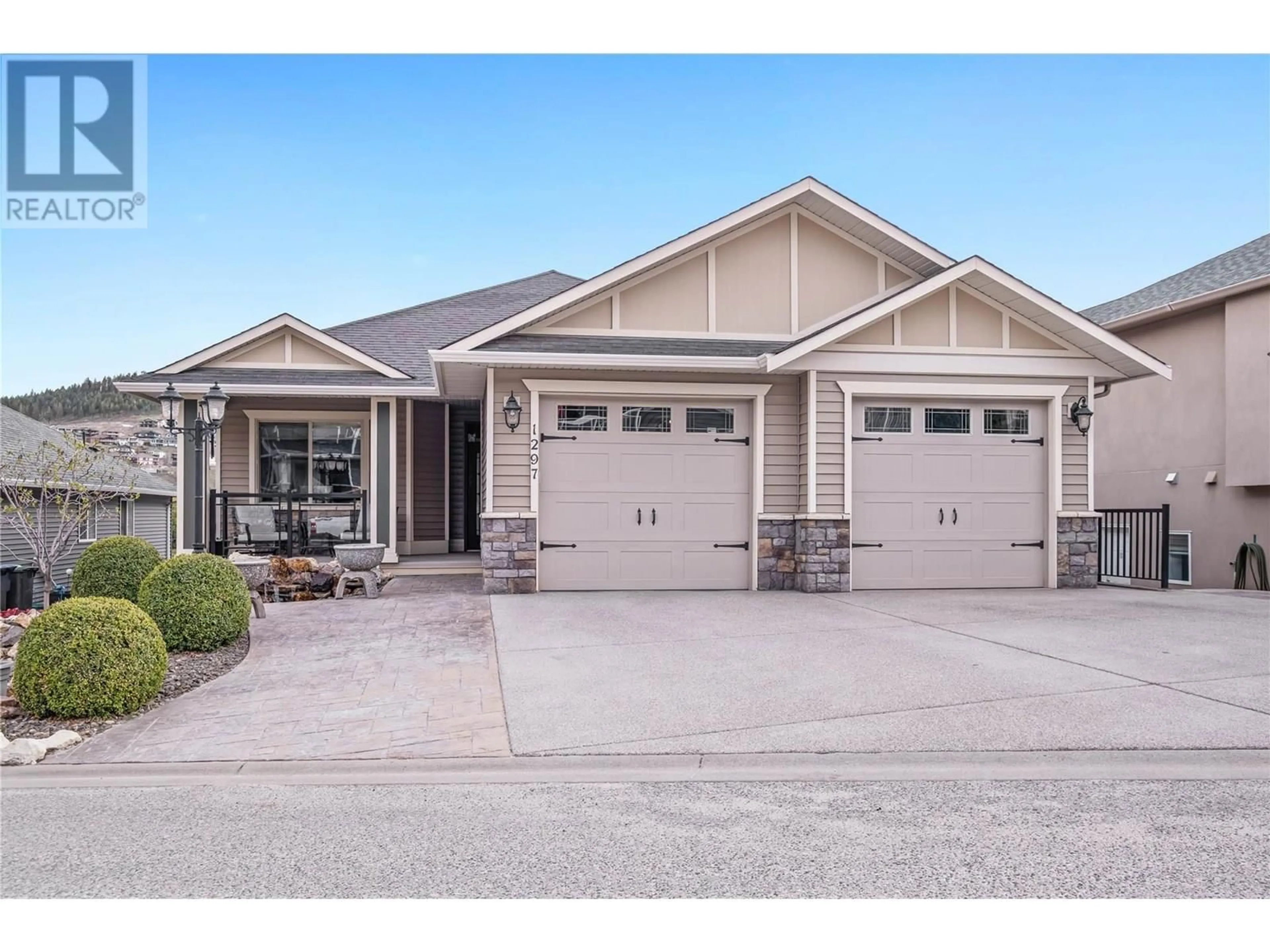 Home with vinyl exterior material, street for 1297 TANEMURA CRESCENT, Kelowna British Columbia V1P1R5