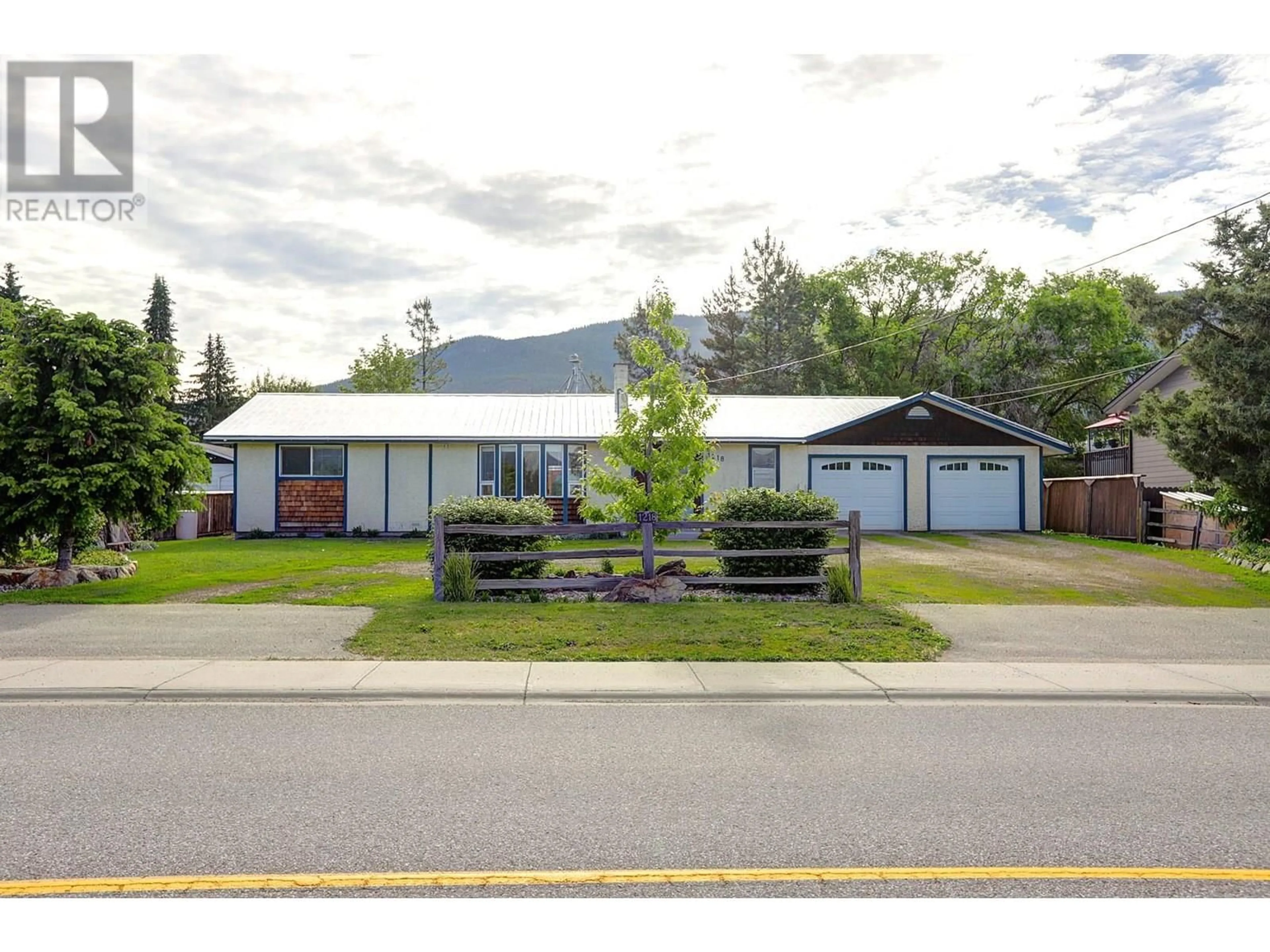Home with vinyl exterior material, street for 1218 OTTER LAKE CROSS ROAD, Armstrong British Columbia V0E1B6