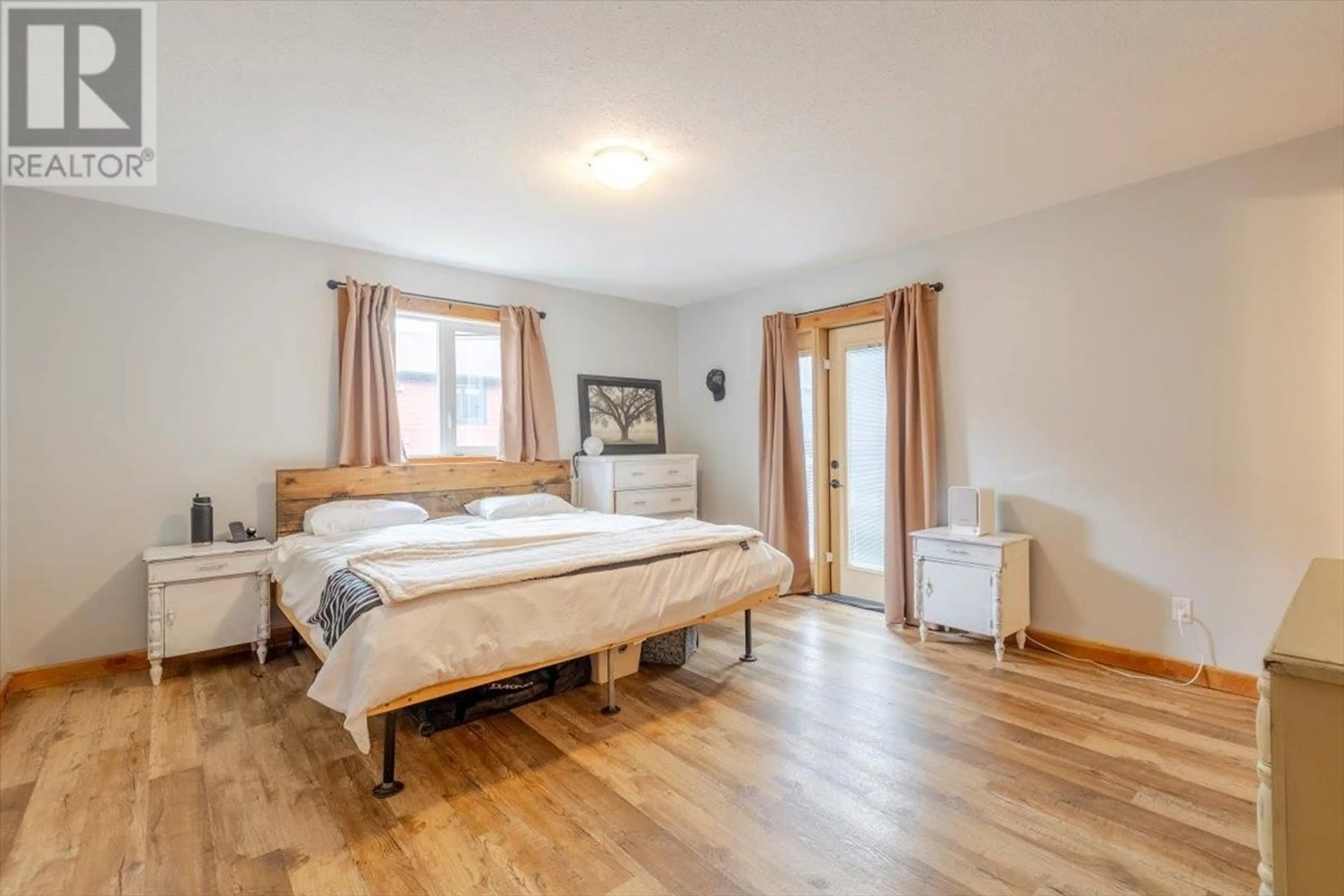 Bedroom with bed, wood/laminate floor for 2074 GOLDEN EAGLE DRIVE, Sparwood British Columbia V0B2G2