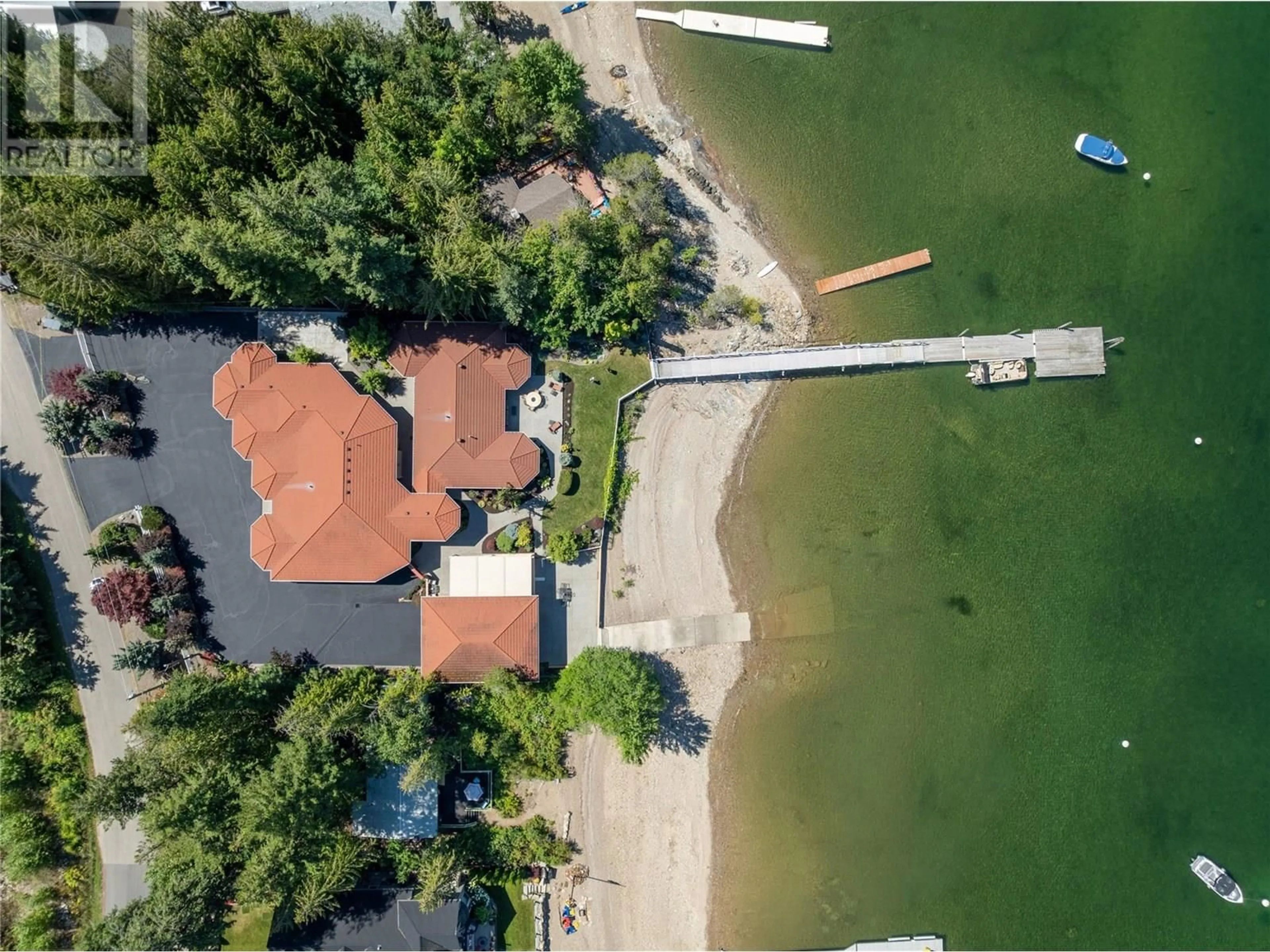 A pic from outside/outdoor area/front of a property/back of a property/a pic from drone, water/lake/river/ocean view for 2471 ROCKY POINT ROAD, Blind Bay British Columbia V0E1H1