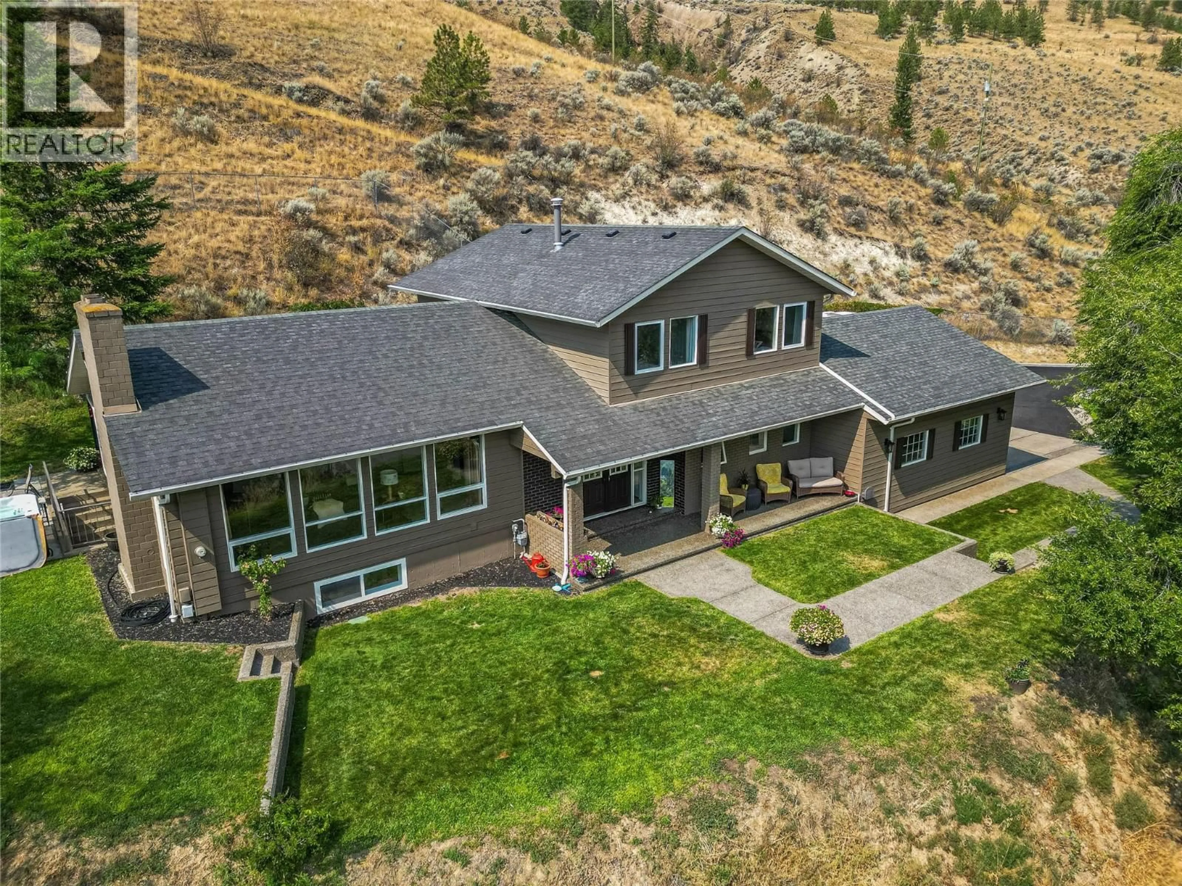 A pic from outside/outdoor area/front of a property/back of a property/a pic from drone, mountain view for 3084 DOHM ROAD, Kamloops British Columbia V2B7L8