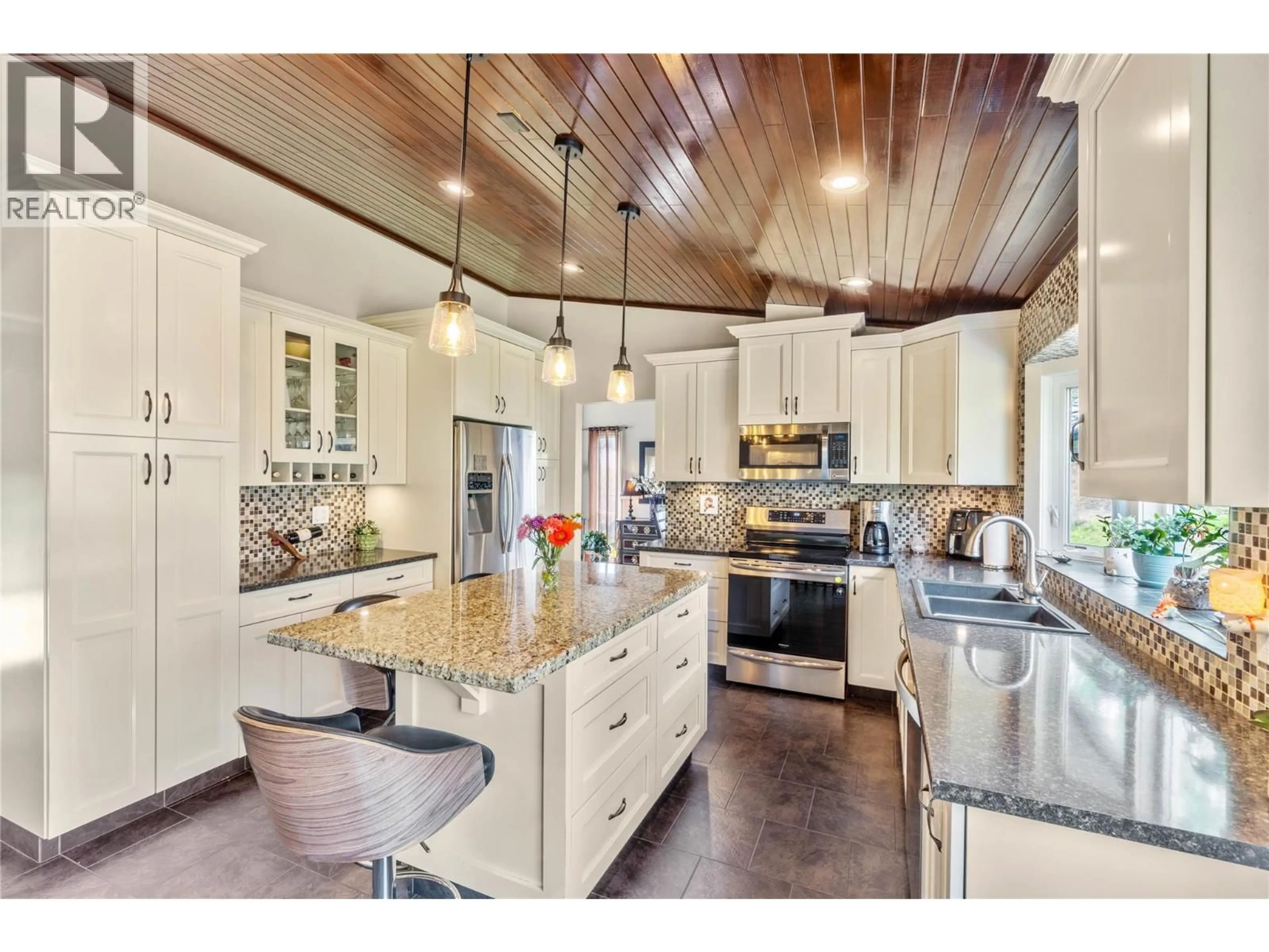 Open concept kitchen, ceramic/tile floor for 3084 DOHM ROAD, Kamloops British Columbia V2B7L8