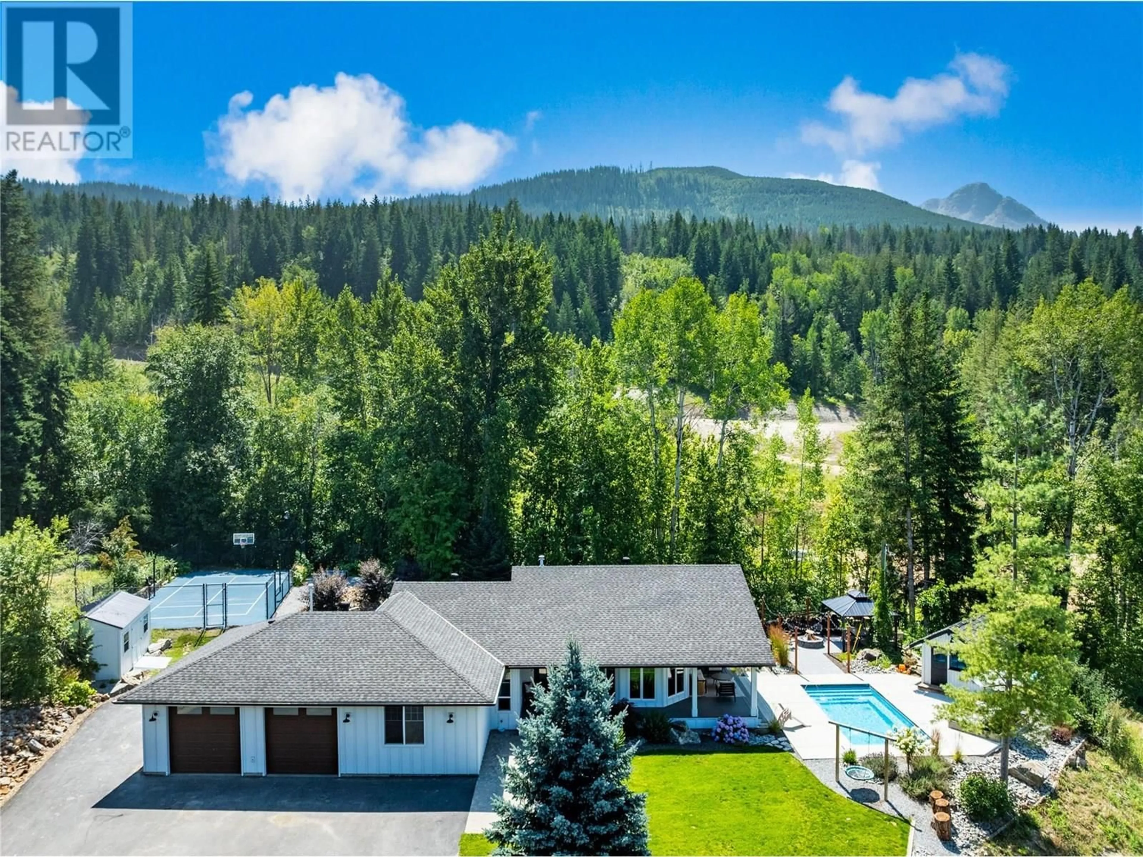 A pic from outside/outdoor area/front of a property/back of a property/a pic from drone, mountain view for 1800 FOOTHILL ROAD SOUTHWEST, Salmon Arm British Columbia V1E1L7