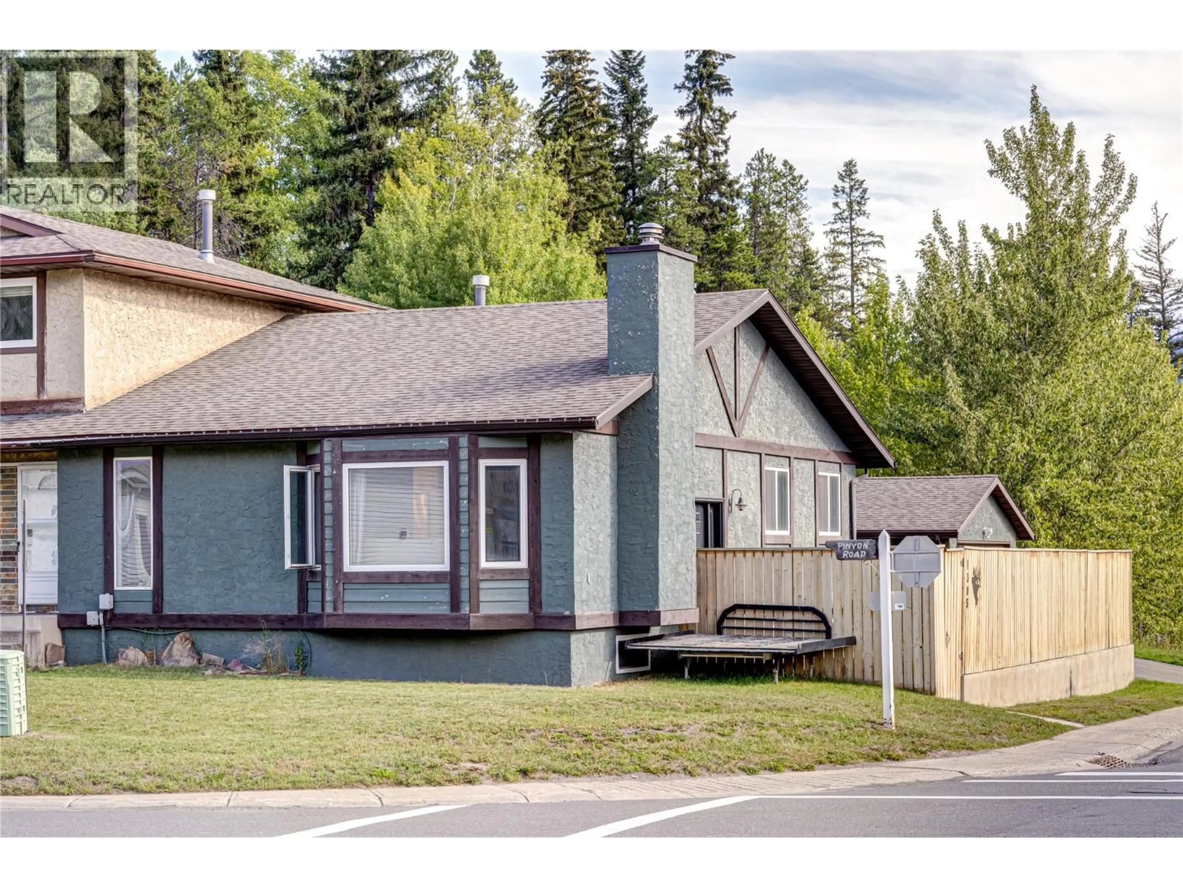 Home with vinyl exterior material, street for 1305 PINYON ROAD, Sparwood British Columbia V0B2G2